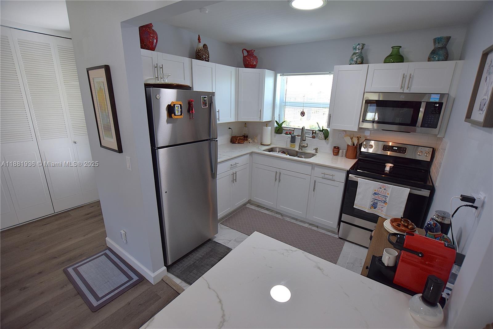 Well-appointed guest bedroom at 2572 Emory Dr - Condo in West Palm Beach