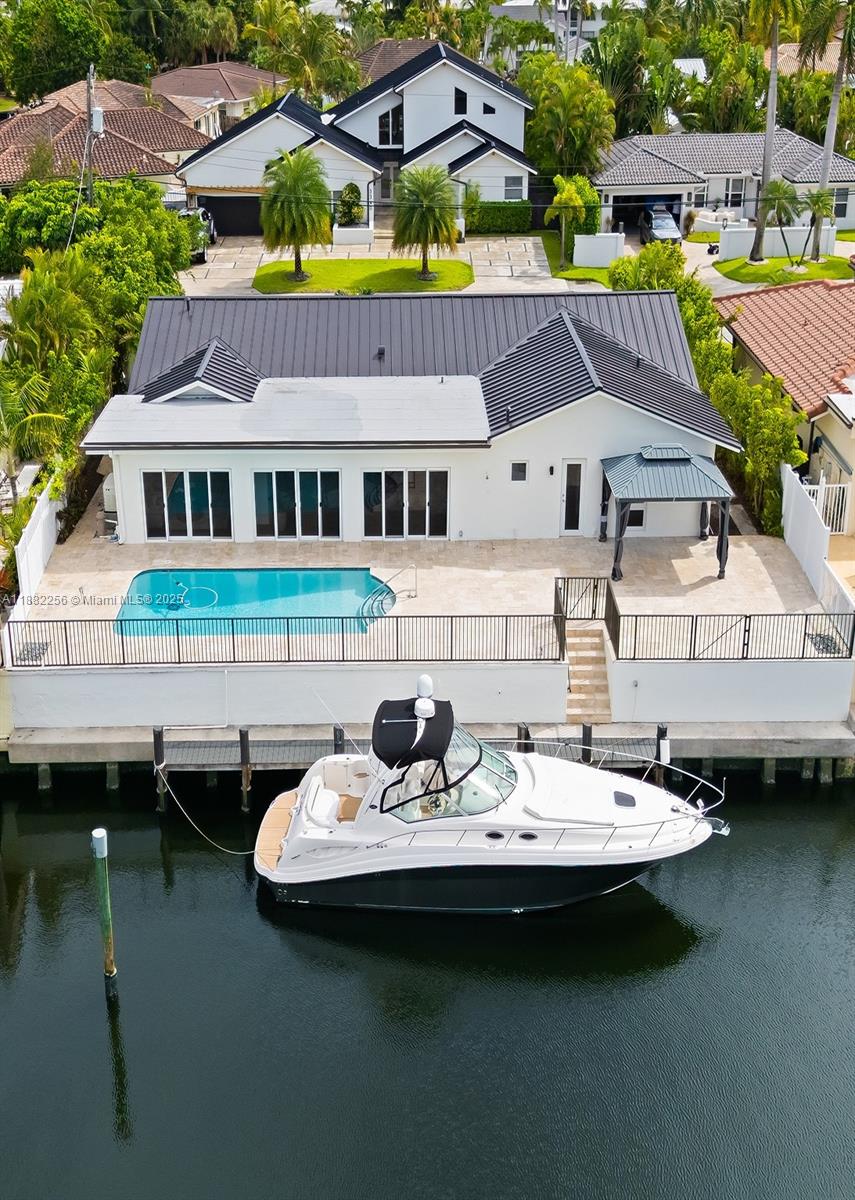 Experience waterfront living at its finest in this stunning 4-bedroom, 3-bath residence located in the exclusive Intracoastal community of Bermuda Riviera. This property boasts an 80-foot newly built dock with direct ocean access and no fixed bridges, just minutes from fine dining, boutique shopping, and pristine beaches.
Step inside to a light-filled, open-concept layout featuring double glass sliding doors, a modern chef’s kitchen with premium appliances, and new engineered wood floors throughout. Outdoors, enjoy a large pool and a cozy pergola, perfect for entertaining or relaxing by the water.
Additional upgrades include a 2025 metal roof, impact doors and windows, a full-house generator, and a lifetime gutter protection system for peace of mind. Amazing A schools nearby.