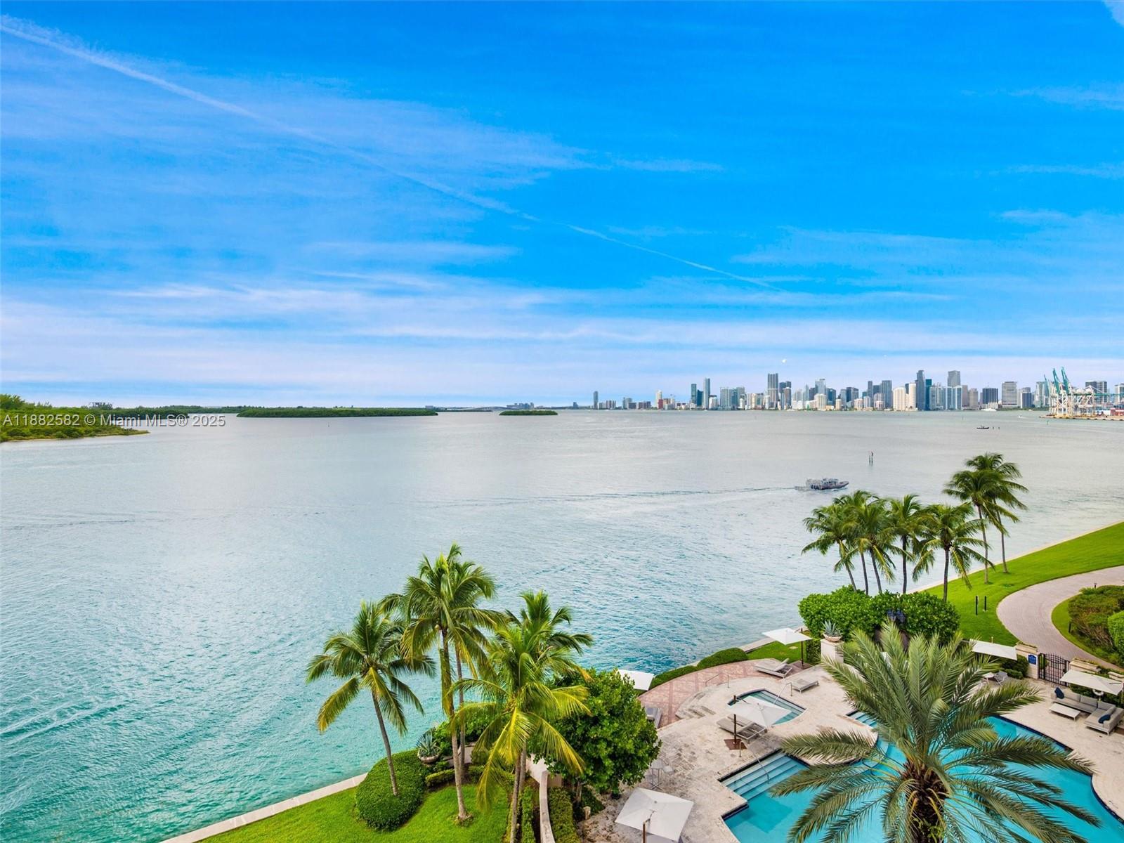 Live the Fisher Island lifestyle in this completely renovated Bayview MASTERPIECE showcasing 3 bedrooms and 3.5 baths, NOW FULLY FURNISHED! It encompasses 3,028 sq ft of elegantly designed interior. Features include: a gourmet kitchen with top-of-the-line appliances, marble floors throughout, built-in TV in living room, custom-designed bathrooms, closets and bar, upscale lighting, impact glass doors, Smart Home system, unobstructed SW views, flow through unit, terraces on all bedrooms and many more improvements. Indulge yourself with breathtaking views of the Miami Downtown Skyline, Virginia Key, Biscayne Bay and Miami Beach from it's expansive terraces that are perfect for entertaining. Visit this exceptional condo!
