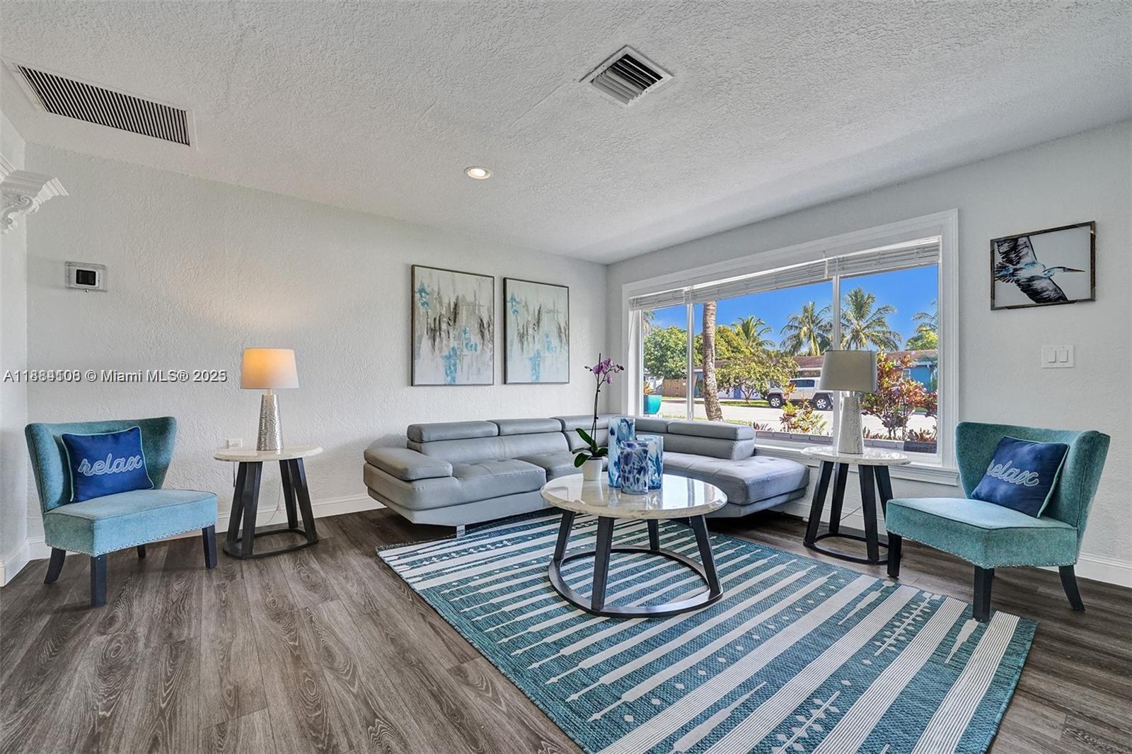 Spacious living room with panoramic views at 3730 47th Ct - Home in Dania Beach