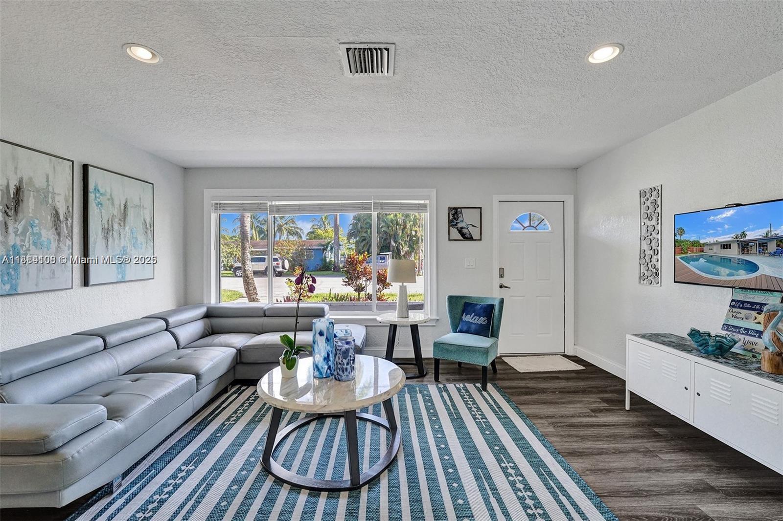 Modern kitchen with designer features at 3730 47th Ct - Home in Dania Beach