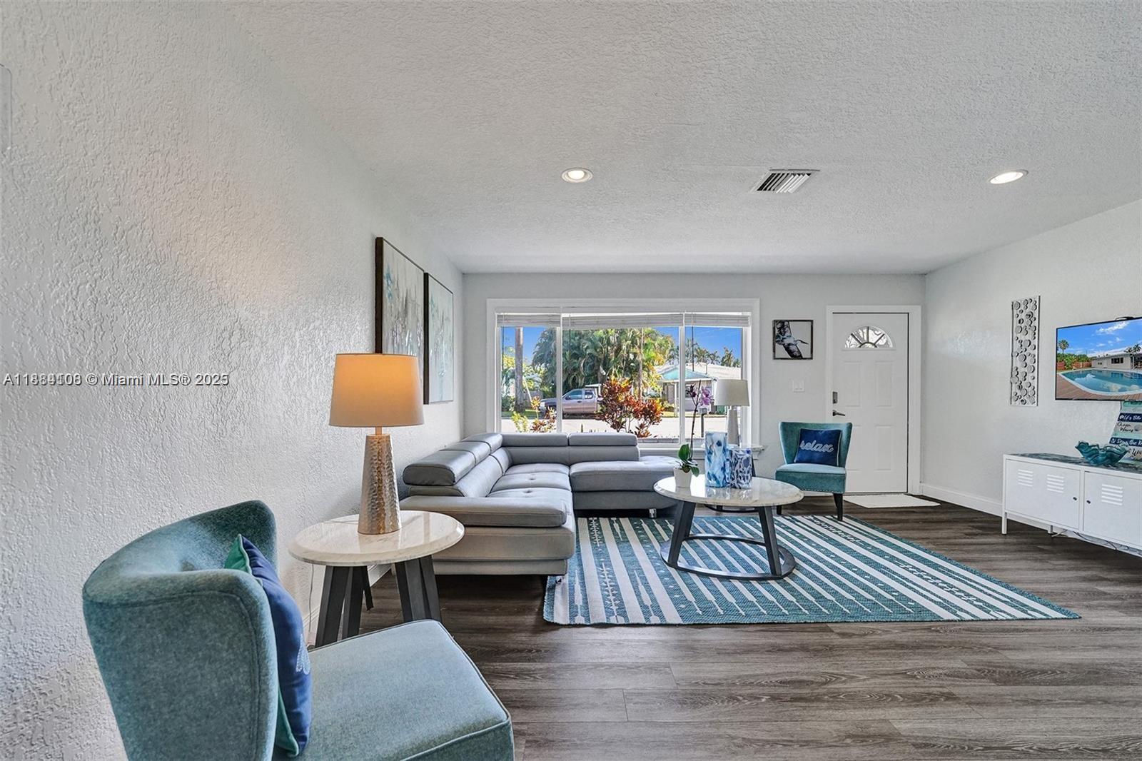 Elegant master bedroom retreat at 3730 47th Ct - Home in Dania Beach