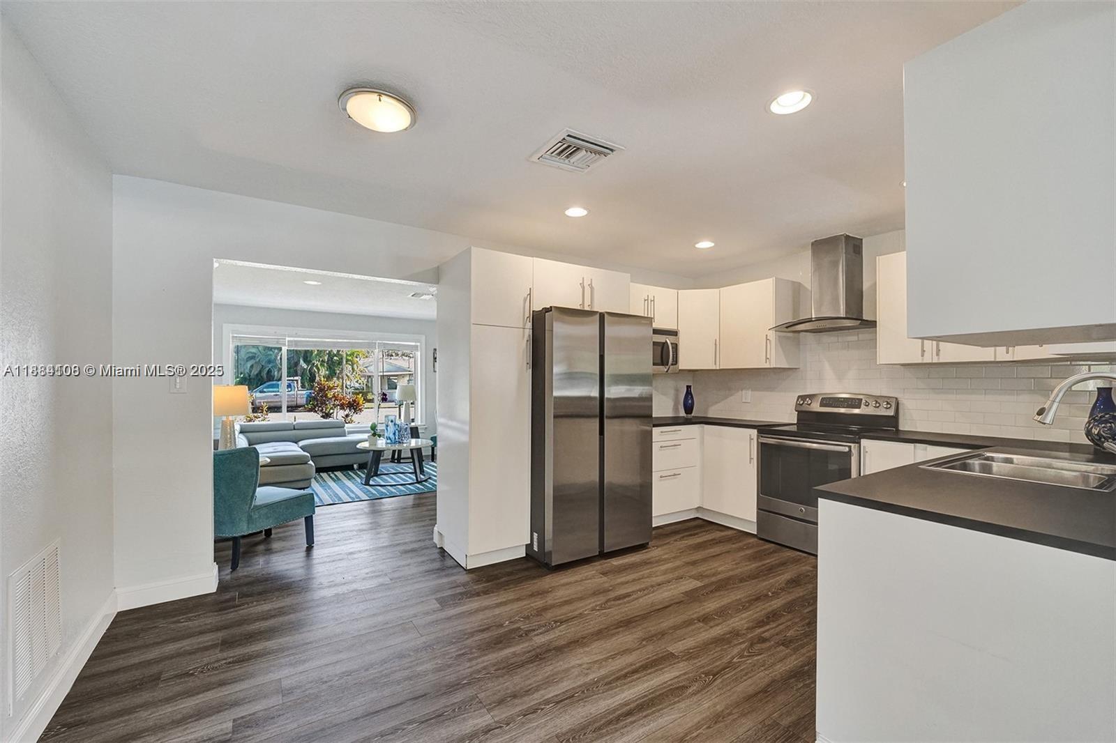 Elegant master bedroom retreat at 3730 47th Ct - Home in Dania Beach