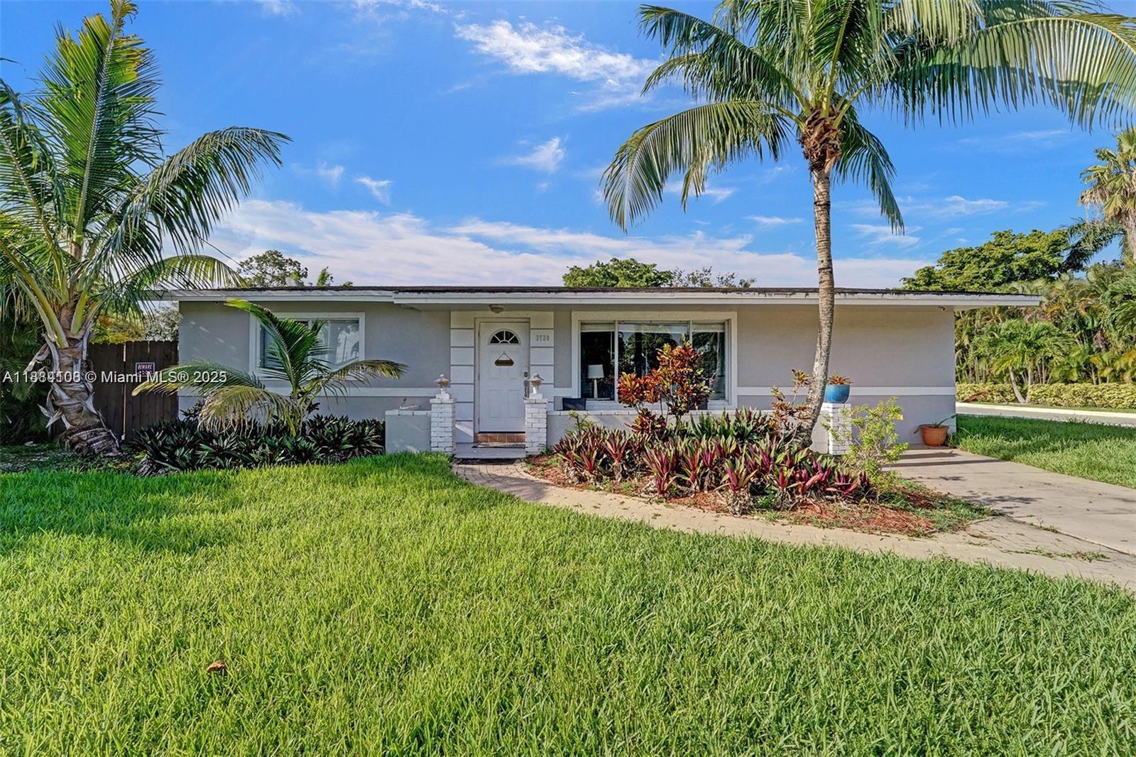Modern kitchen with designer features at 3730 47th Ct - Home in Dania Beach