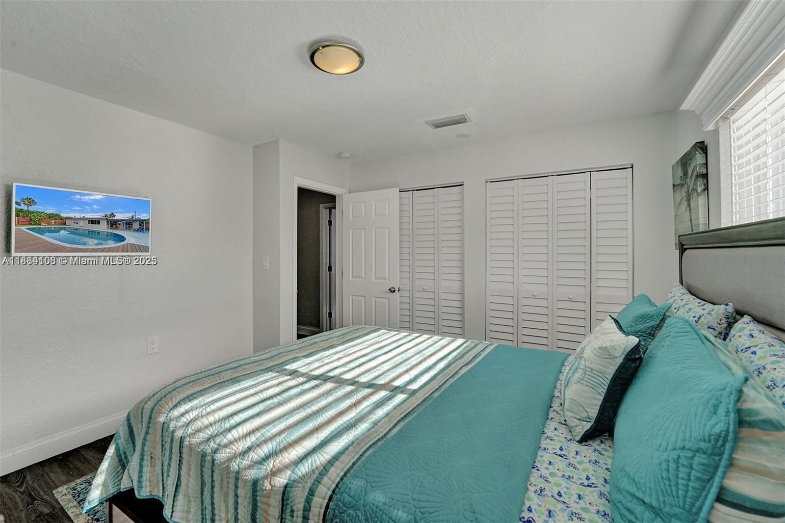 Well-appointed guest bedroom at 3730 47th Ct - Home in Dania Beach