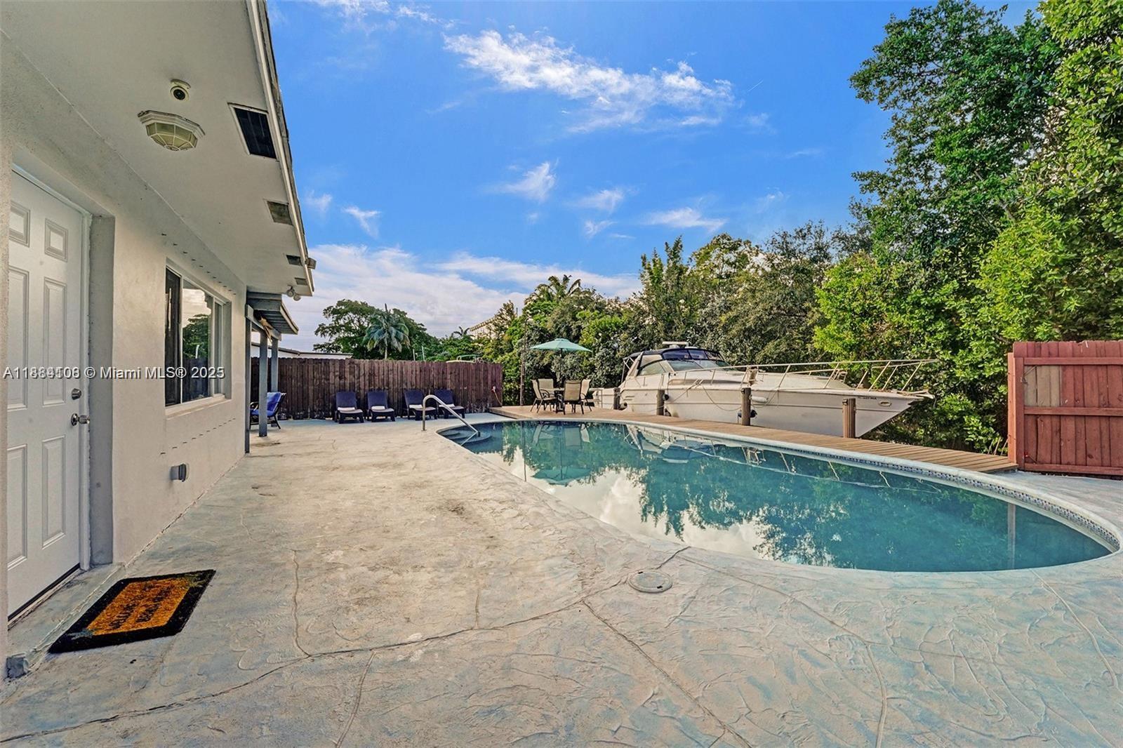 Well-appointed guest bedroom at 3730 47th Ct - Home in Dania Beach