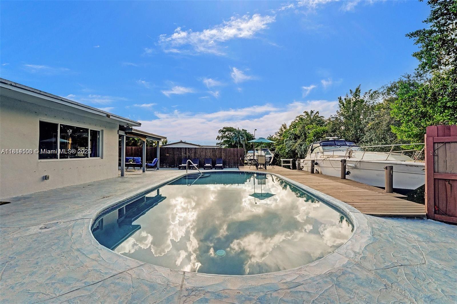 Spacious living room with panoramic views at 3730 47th Ct - Home in Dania Beach