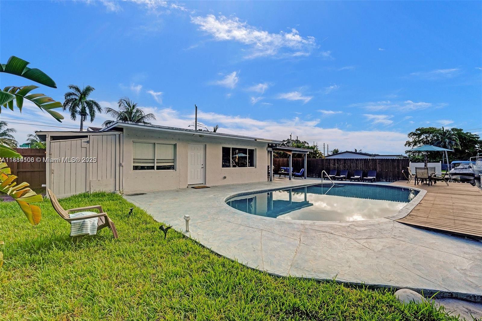 Modern kitchen with designer features at 3730 47th Ct - Home in Dania Beach