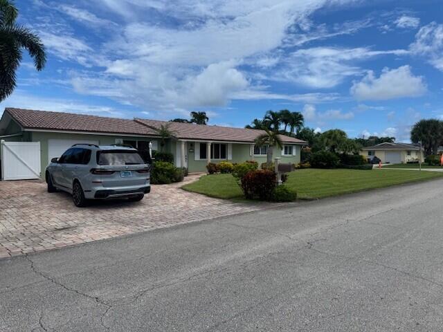 Homes for sale in Lake Clarke Shores, FL | 1915 Arabian Road W, Lake Clarke Shores, FL 33406 | MLS# R11127263