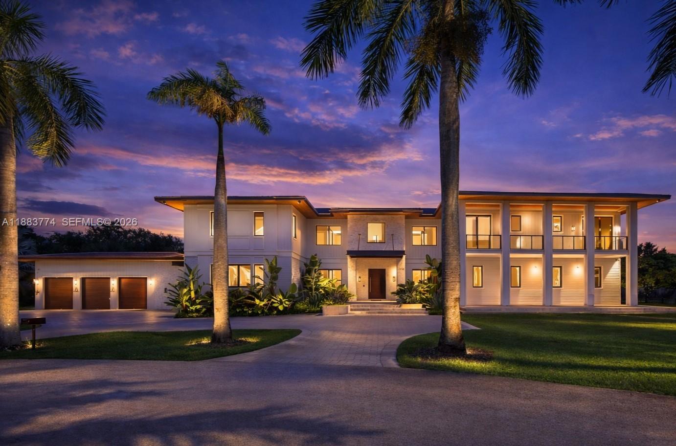 A timeless blend of elegance and comfort, this exceptional two-story residence offers 7 bedrooms, 7 full baths, and 1 half bath, thoughtfully curated for refined living. Soaring volume ceilings, impact glass, and bespoke built-ins elevate each space with understated sophistication. The gourmet kitchen showcases custom cabinetry, Wolf appliances, Sub-Zero refrigeration, and a Sub-Zero wine cooler, seamlessly flowing into the wet bar and living areas. A glass-enclosed porch with a summer kitchen featuring a pizza oven invites effortless indoor-outdoor entertaining. Additional highlights include a club room, media room, and the potential for a backyard pickleball court with available renderings.