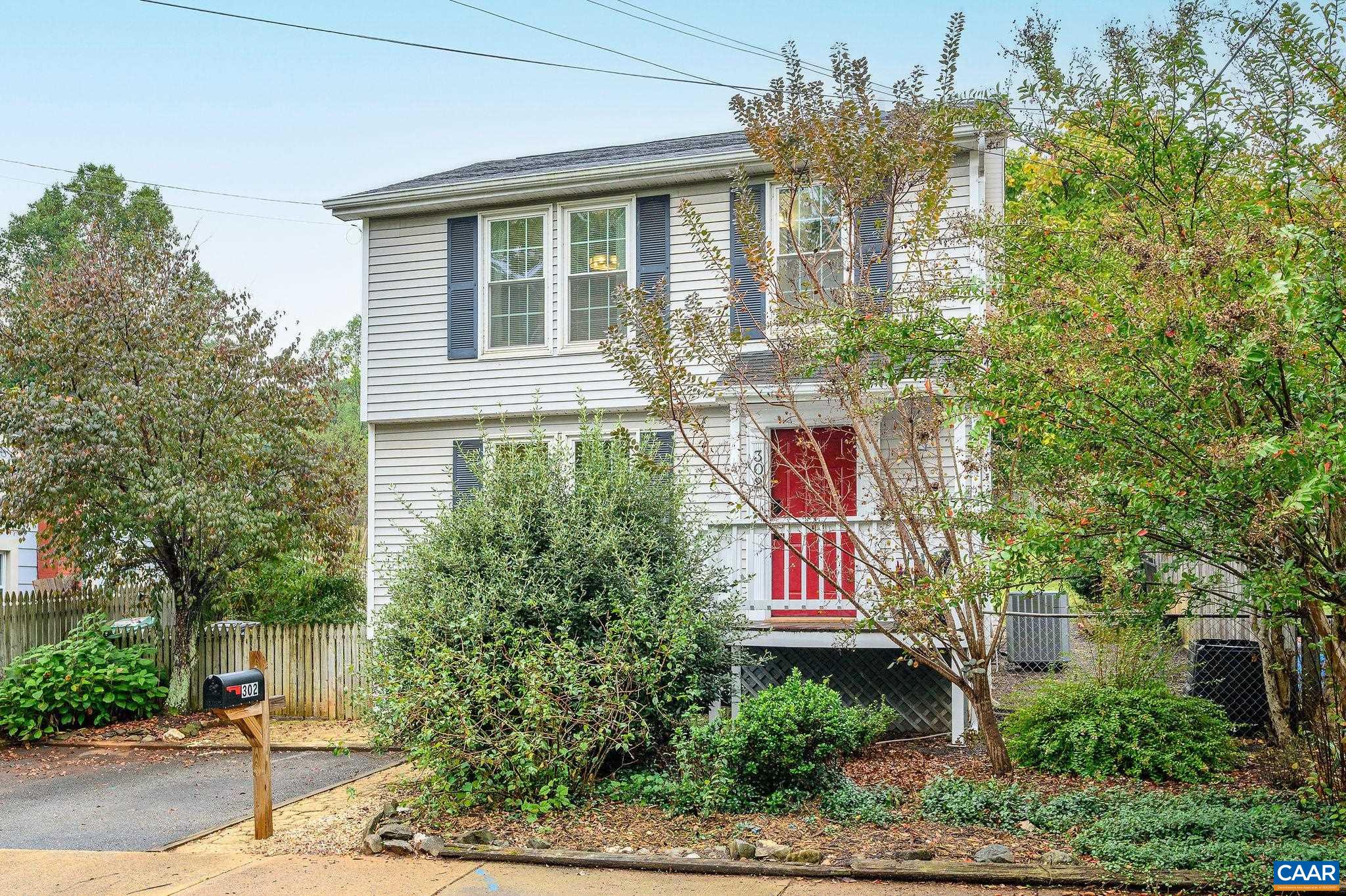 MUST-SEE BELMONT GEM with MODERN UPDATES & SOLAR! This 3 bed, 2.5 bath home shines with stylish updates and energy-saving features in one of Charlottesville’s most vibrant neighborhoods. Sunlight pours through generous windows on the main level, where an airy living room flows to a stylish kitchen with breakfast nook & a sunny flex space ideal for lounging or a home office. Upstairs, the primary suite offers a renovated primary bath with modern fixtures, tiled shower with frameless glass door & fresh finishes; two additional bedrooms, all with durable laminate flooring & a full hall bath. Discerning upgrades include: new kitchen appliances, beautiful white solid-surface countertops and LVP flooring, rooftop solar panels, and a smart thermostat, to name a few. Step outside to a private deck & fully fenced back yard, perfect for lively gatherings or peaceful evenings. Desirable off-street parking & mature landscaping complete the picture. This move-in ready & thoughtfully updated home lives larger than the exterior would lead you to believe in Belmont’s trail-friendly enclave, just steps to Quarry Park, the Rivanna Trail System & Moores Creek, with easy access to I-64, and only minutes to downtown, 5th Street Station, Pantops & UVA.