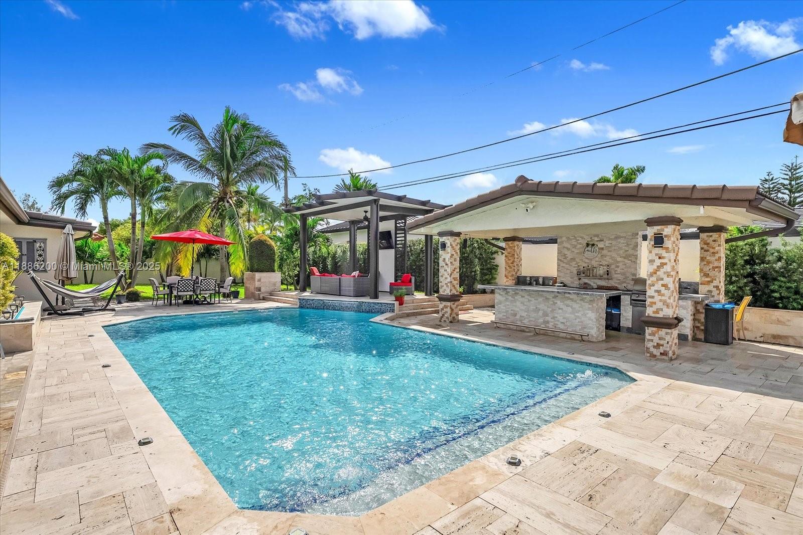 A special chance to own one of Doral’s most desirable homes! This stunning residence offers nearly 2,800 sf of refined living one of the rare oversized triple-lots. Recently renovated, this home features an updated tile roof, 2 new air conditions, impact doors and windows, a sparkling saltwater pool, a generator, completely upgraded bathrooms, and a spacious layout perfect for both entertaining and everyday living. 

Step outside to your private backyard retreat, where lush landscaping frames the pool deck, ideal for family gatherings or quiet evenings under the Miami sky.  This backyard is special with multiple pergolas, covered terraces, accent lighting , and much more. 

One of the few Doral homes with no HOA restrictions.  See it for yourself. Will not last long!