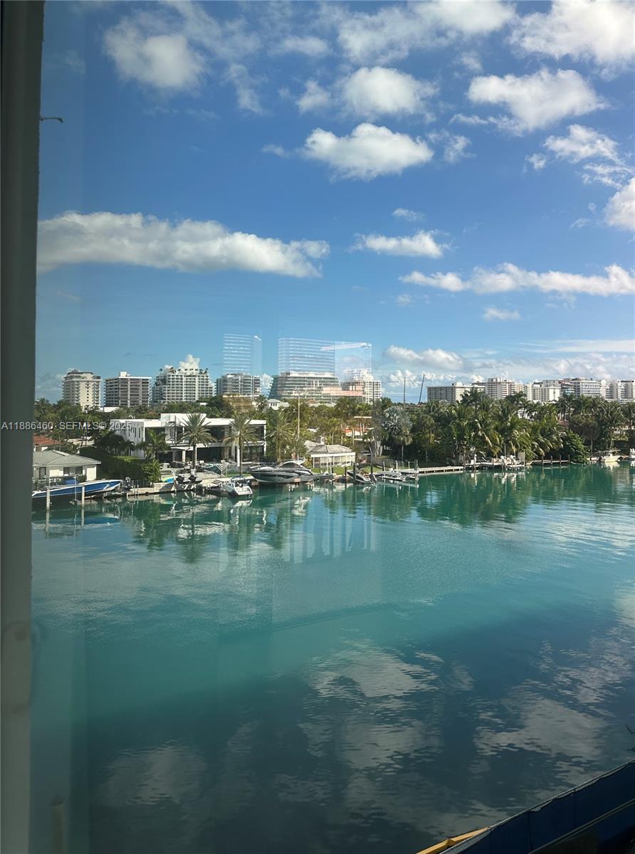 Well-appointed guest bedroom at 9501 Bay Harbor Dr - Home in Bay Harbor Islands