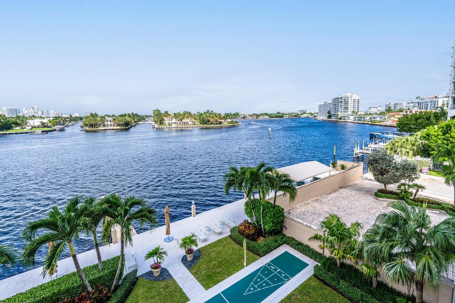 Widest point of the Intracoastal Waterway with views to take your breath away!! This lovely midcentury boutique building with only 41 units, has been meticulously maintained with pride. 50 year and SIRS completed, new roof September 2025. Wall to wall impact windows that make you feel as if you are on the bow of a yacht, Pool and deck have recently undergone a spectacular renovation, waiting for you to enjoy. The boating activity and glorious sunsets.