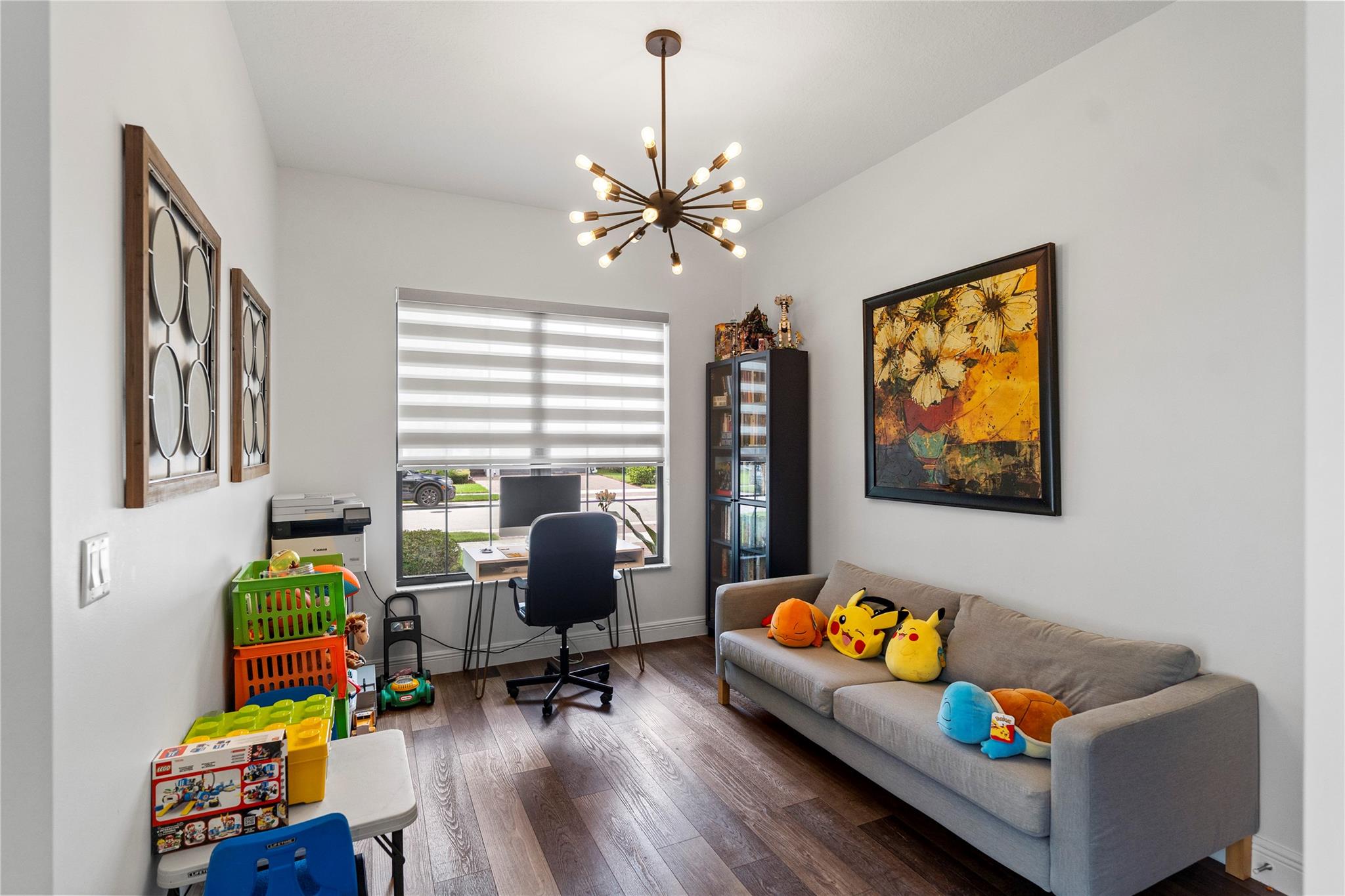 den / game room with closet.