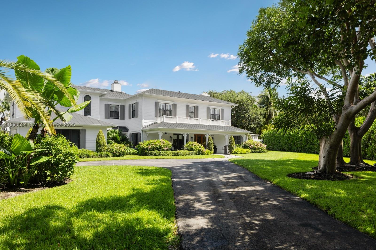 Beautifully renovated modern farmhouse in North Palmetto Bay, set on a quiet tree-lined cul-de-sac. This 5BR/4BA home features vaulted ceilings, a split floor plan, and elegant porcelain and wood floors. The chef’s kitchen includes quartz countertops, a spacious island, premium appliances, and a 48” gas range. The primary suite offers a spa-like bath, walk-in closet, and private office. Outdoors, enjoy a fenced backyard with mature trees, gazebo, and pool surrounded by timeless Chicago brick—an inviting retreat for South Florida living.