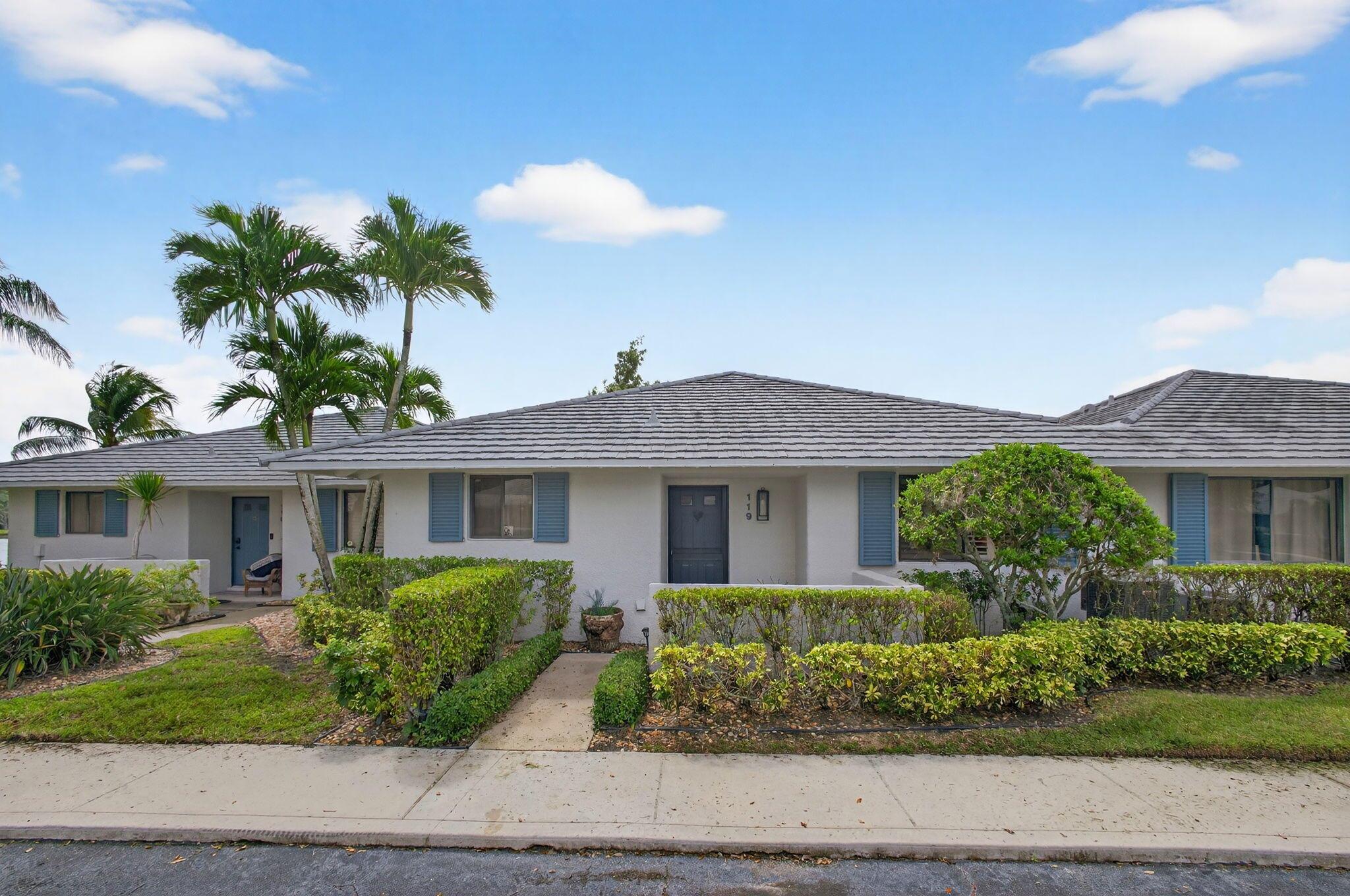 Charming Club Cottage in Prime Location closest to all the fabulous PGA Amenities & Resort. Lovely Lake View from your back Patio. French Cottage Inspired renovations, beautifully remodeled bathrooms. Kitchen has custom wood cabinetry & granite counter tops, open concept. Fully Furnished & Turnkey Villa. Full sized, High-end washer and dryer. Tile & Composite Wood Flooring upgrades, custom molding and finishes throughout. Master Bedroom has Walk-in Closet with custom built-ins, newer tankless water heater & safe. Beautiful views of Lake. Upgraded Light Fixtures and Window Treatments, Plantation Shutters. Open Spacious Main Living with Cathedral Ceiling and NO Steps. Perfect One-Level Living and easy to get around in this picturesque waterfront Villa.