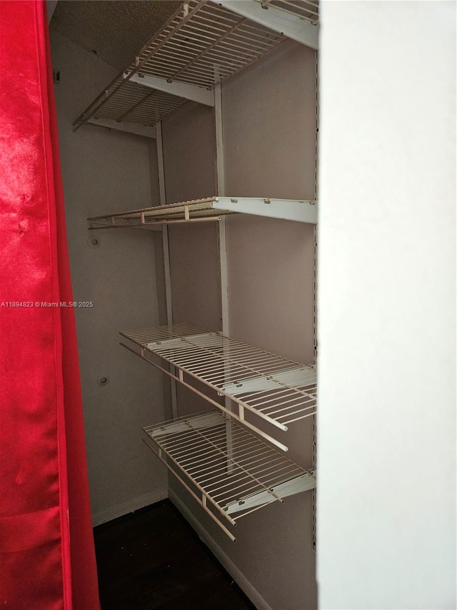 Well-appointed guest bedroom at 2511 56th Ave - Condo in Lauderhill