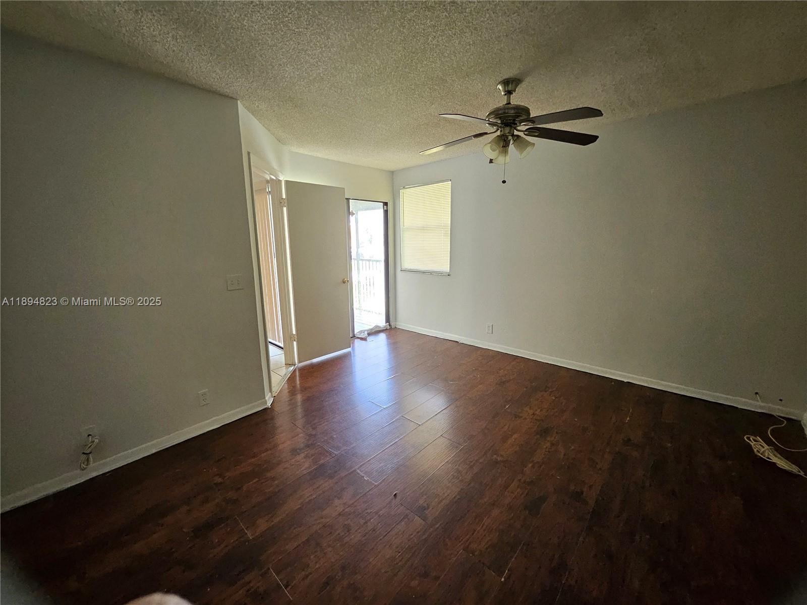 Well-appointed guest bedroom at 2511 56th Ave - Condo in Lauderhill