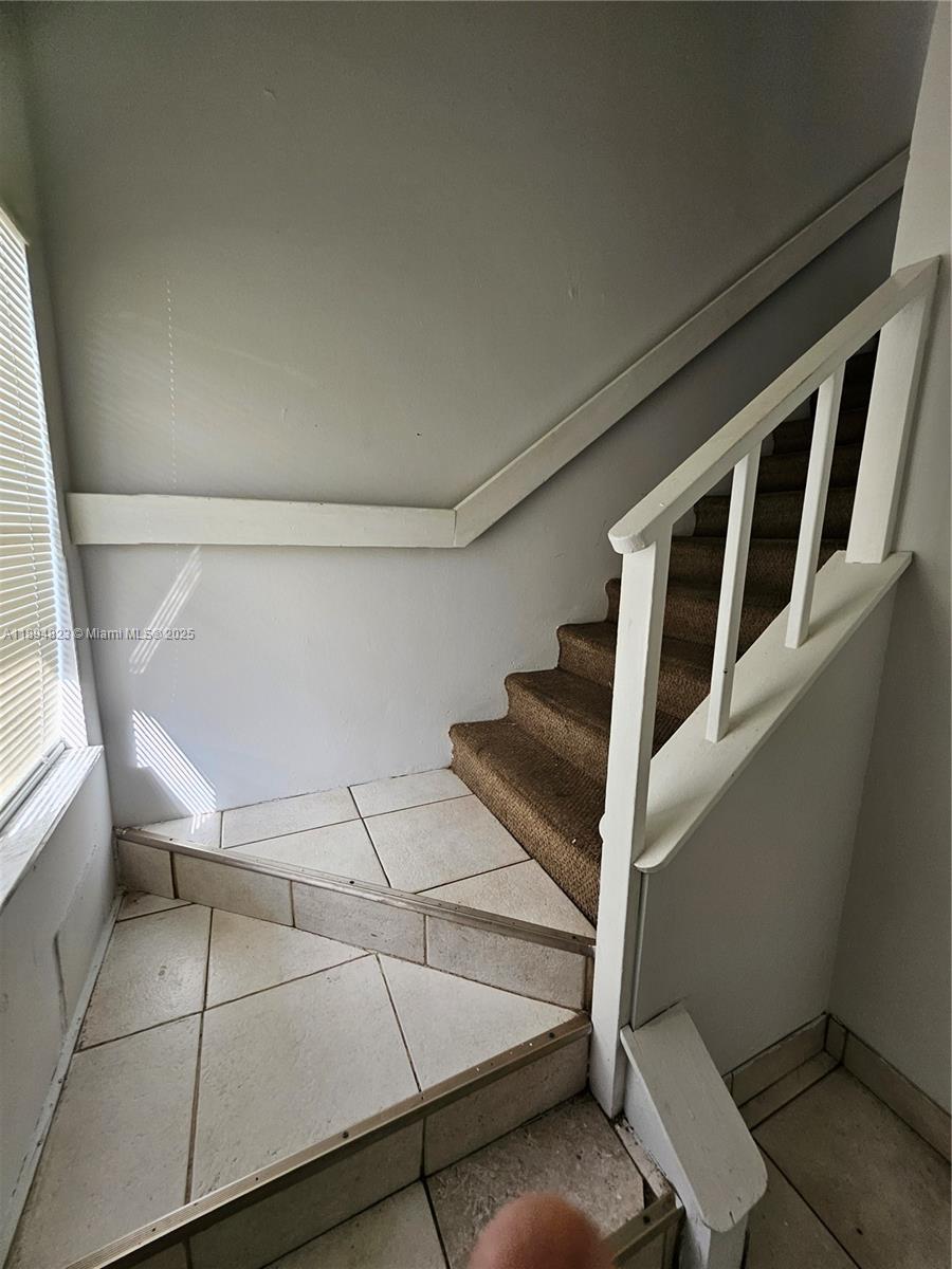Well-appointed guest bedroom at 2511 56th Ave - Condo in Lauderhill