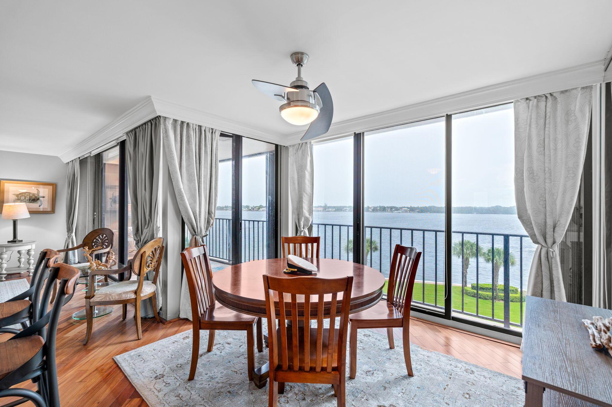 Come see this beautiful, fully renovated and fully furnished pet friendly, 2 bedroom, 2 bathroom condo featuring panoramic waterfront views! This condominium features stainless steel appliances, updated bathrooms, wood flooring and an in unit washer and dryer. Feel the comfort of hurricane protection taking care of the floor to cieling windows and covered balcony. This property boasts a resort style pool, tennis courts, fitness center, and a waterfront 2 mile path. Water, internet and cable are all included with your monthly condo fees. Old Port Cove is known for its resort style living including a full service marina, restuarant, 24 hour manned guard gate and so much more. 5 minutes from WORLD class shopping, dinning, and the prestigus Jack Nicholas signature golf & tennis center.