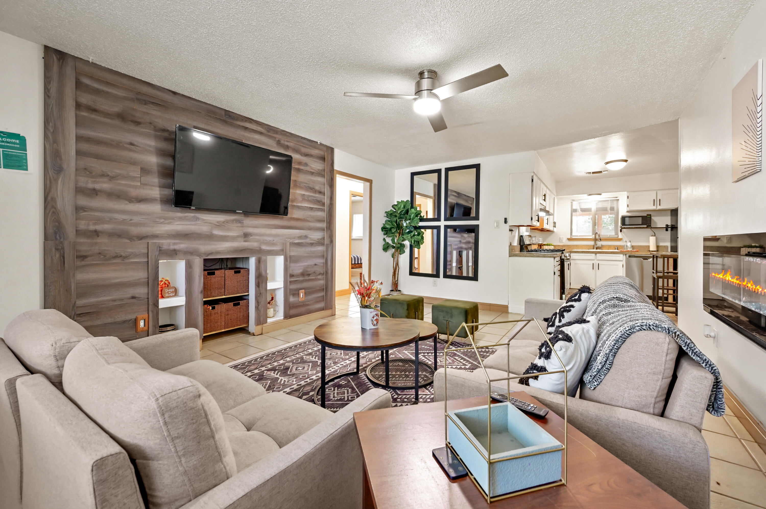 Under Contract Taking Backup Offers. On a quiet street in the Near South Valley, this well-maintained, single-level home with a large fenced backyard is  located in the heart of ABQ! A short walk or bike ride to the Bosque Trail, Aquarium, Botanical Garden and just minutes by car to Sawmill Market, Old Town & UNM, this home is perfect for young families, retirees, really anyone who wants a cozy spot close to services, restaurants & the beautiful Rio Grande. Recent upgrades include a pro panel roof, renovated bathrooms, new AC unit & synthetic turf. Investors take note -- this property has been operating as a successful Airbnb since 2023 & a long term rental prior. Don't miss this one!