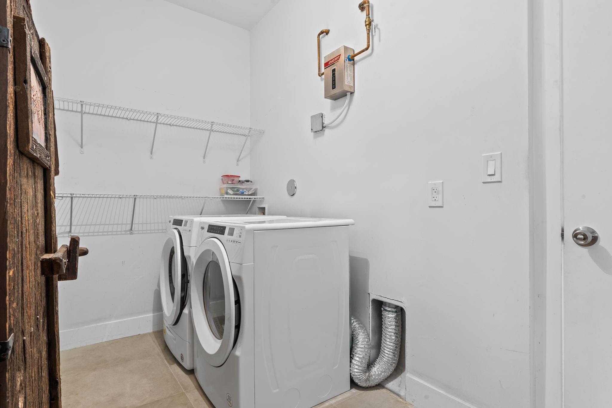 Laundry Room & Plenty of Storage.