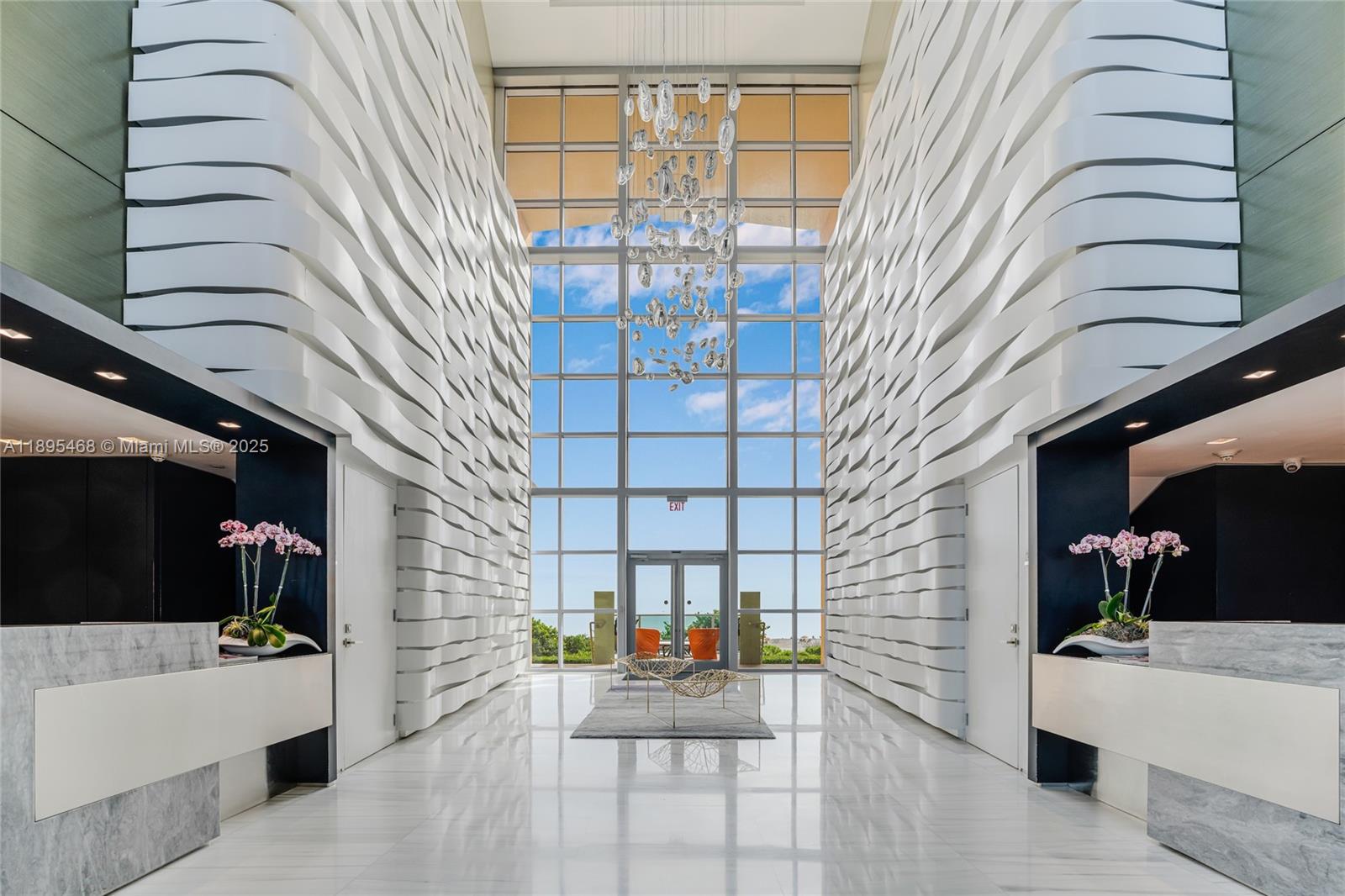 IL Villaggio stands as one of Miami Beach’s most prestigious boutique condominiums, designed by renowned architect Luis Revuelta. Residence at IL Villaggio showcases sweeping views of the Atlantic Ocean and a pristine white sandy beach through floor-to-ceiling windows in every room, opening onto expansive four hundred and eighty-two square feet terrace. This residence creates a serene retreat, which is both relaxing and perfect for entertaining, above the vibrant South Beach neighborhood. The residence gives the ideal balance of privacy and resort-style living, featuring 2 split bedrooms, 3 and a half bathrooms, and a versatile extra room perfect as a guest suite, den, or home office.