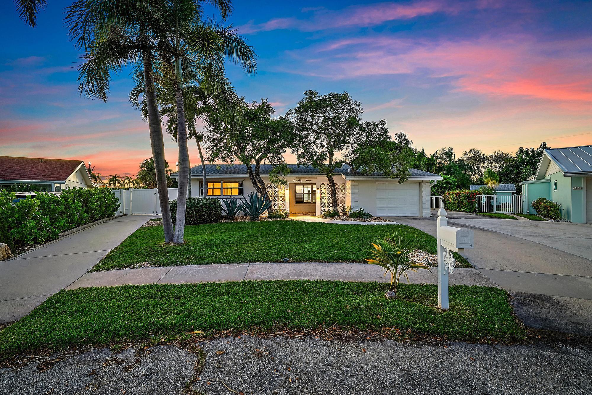 Discover the perfect blend of coastal charm and everyday comfort in this beautifully updated CBS home tucked away on a quiet Tequesta cul-de-sac. Set on a large pie-shaped lot, the property offers exceptional outdoor living -- a sparkling pool, expansive green space, and generous driveway space on both sides of the home, including a 40-foot concrete pad ideal for boat or RV parking.Inside, the home exudes a fresh, coastal feel with wood-look ceramic tile flooring throughout and a bright, open layout designed for relaxed living. The kitchen features quartz countertops, ample counter space, a large pantry, and a convenient pass-through to the patio -- perfect for entertaining. The spacious Florida room opens to the pool area, creating a seamless indoor-outdoor flow. The primary suite offers a walk-in closet and serene backyard views, while the additional bedrooms include built-in closets and ceiling fans in every room. The living area includes a wall-mounted TV and a cozy electric fireplace feature for added ambiance.

The one-car garage is versatile and well maintained, featuring a painted concrete floor, insulated garage door, new 2024 A/C and heating wall unit, washer and dryer, and a second refrigerator &#x14; all included. Major updates provide peace of mind with a new roof (2021), A/C (2020), and full hurricane protection throughout.

Enjoy privacy and peace with no rear neighbors &#x14; the back wall is city-owned and maintained, with an easement that enhances the usable yard space. Located just minutes from Jupiter's turquoise waters, scenic boat ramps, and the Inlet Village, this home combines convenience, quality, and the best of Florida's coastal lifestyle.