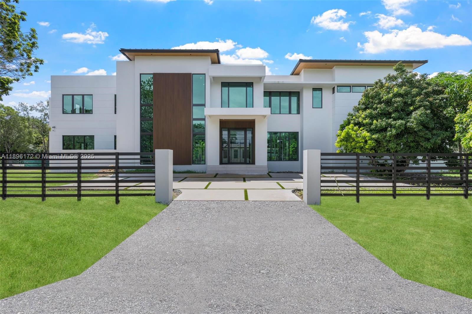 Experience luxury and comfort in this beautifully crafted 6-bedroom, 6.5-bath home set on a spacious 37,026 sq ft lot in desirable Palmetto Bay. Thoughtfully designed with walk-in closets, custom built-ins, and refined finishes throughout. Enjoy the elegance of the media room, wet bar, wine storage, and smart media panel for effortless living. Entertain on the expansive covered terrace or unwind in your private retreat. A sleek elevator adds convenience, and the detached guest house with kitchenette is perfect for hosting family or friends. A rare blend of space, style, and function.