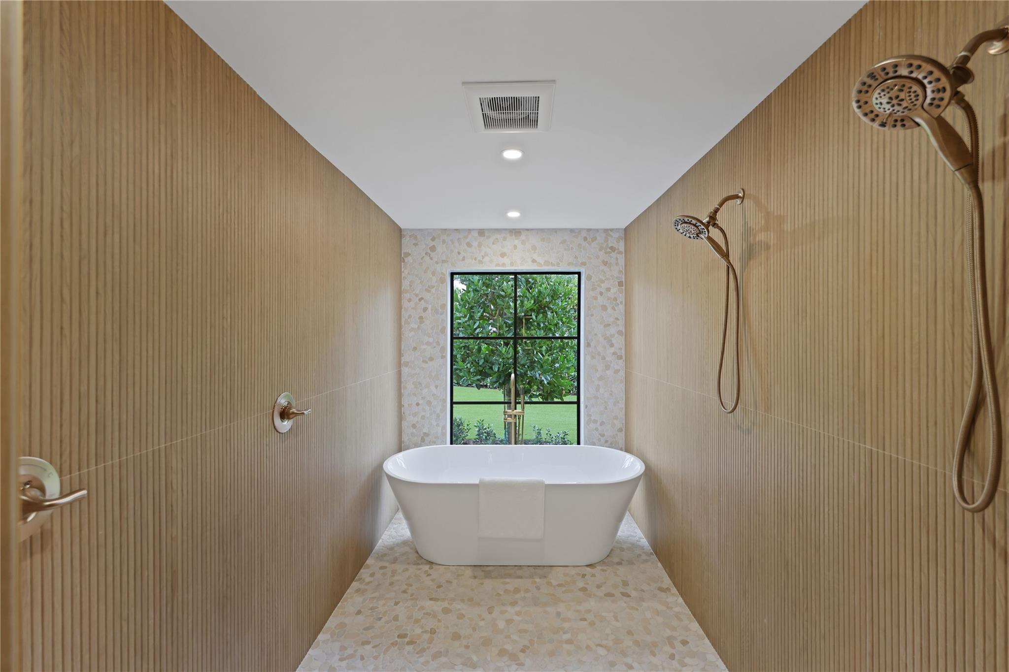 First Floor Primary Tub/Shower with Dual Shower Heads