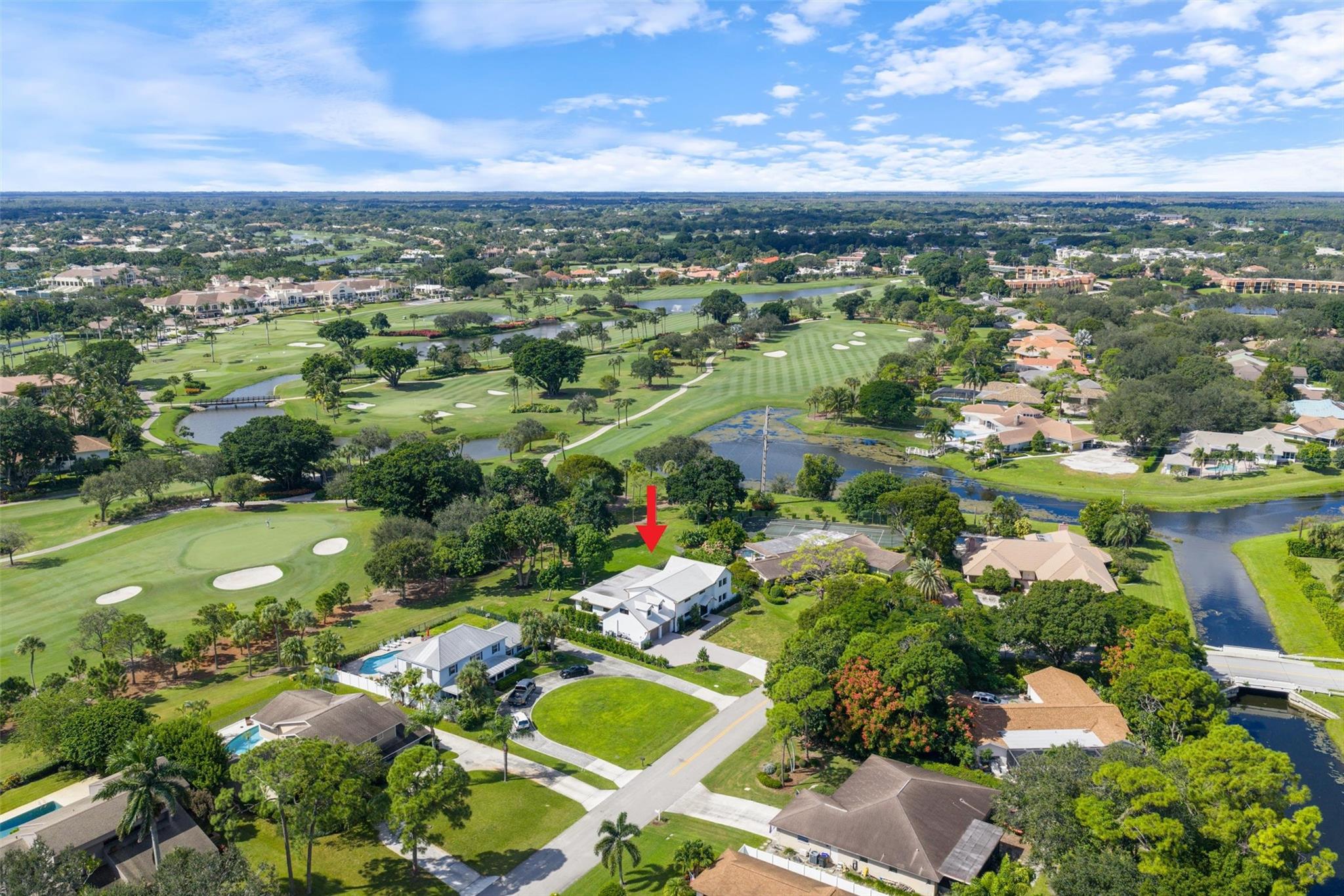 Backs up to BallenIsles Country Club