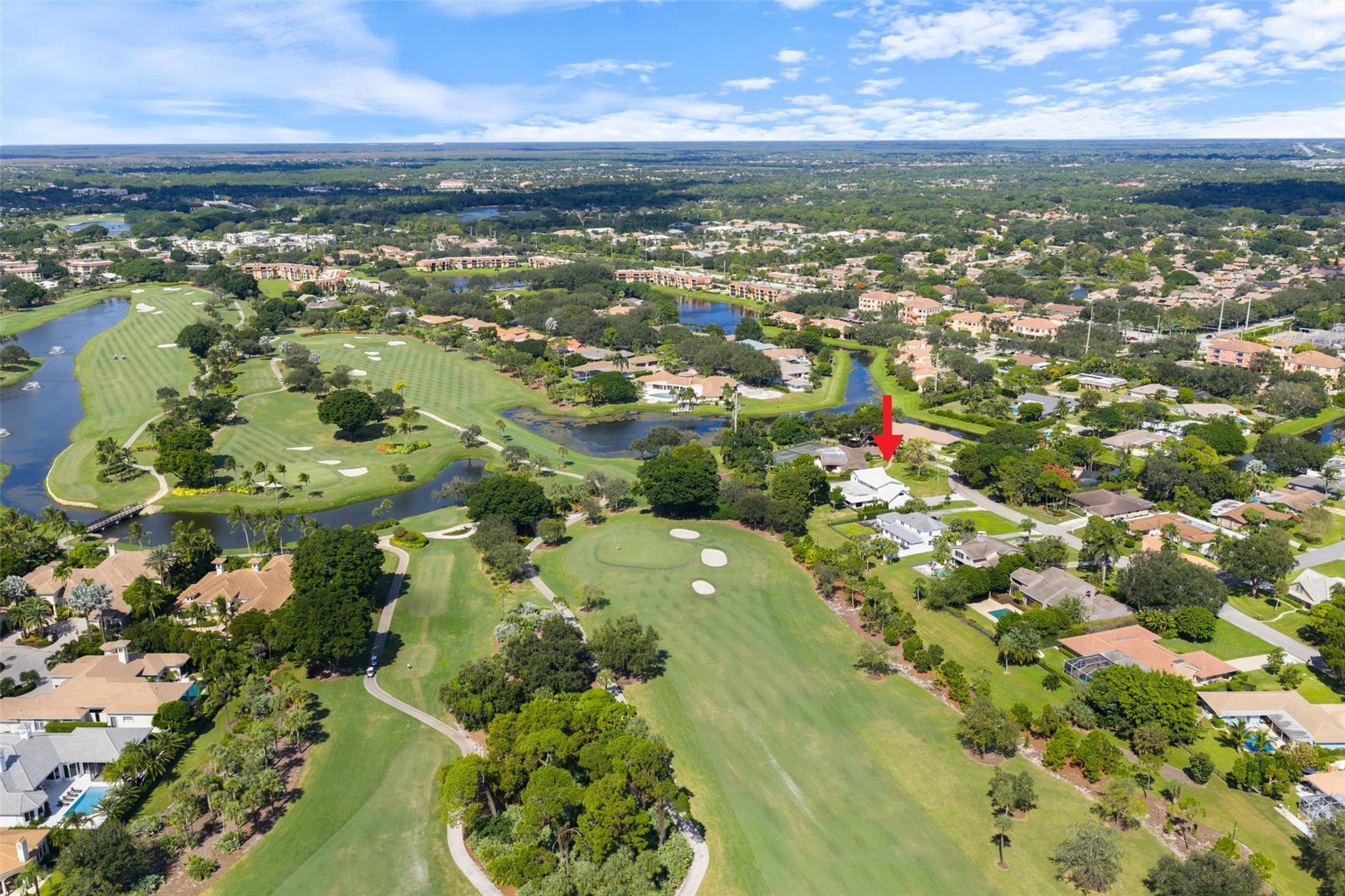 Backs up to BallenIsles Country Club