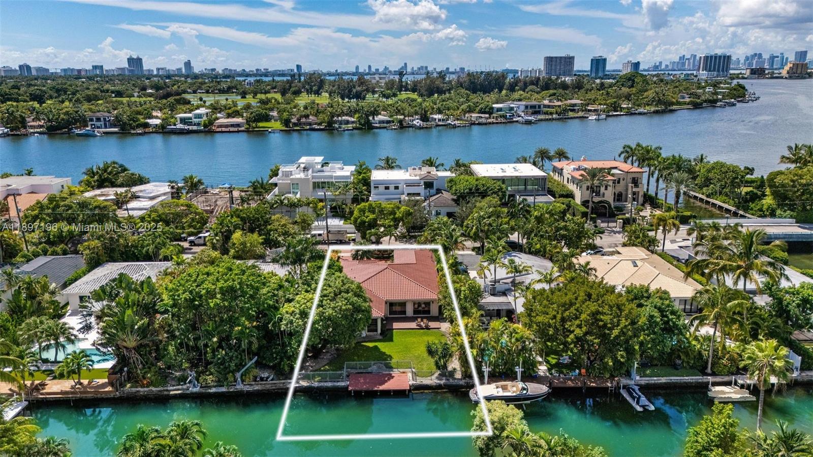 Welcome to this timeless Biscayne Point residence in Miami Beach. This single-story home offers ~2,828 sq ft of living space, featuring 3 bedrooms and 2 full bathrooms. Positioned on a generous 9,000 sq ft lot, the property delivers rare privacy and potential in one of the city’s most coveted neighborhoods. With classic bones and room for modernization, the home invites transformation into a modern sanctuary. Enjoy easy access to the waterfront lifestyle, nearby parks, top schools, and the vibrant Miami Beach scene..
