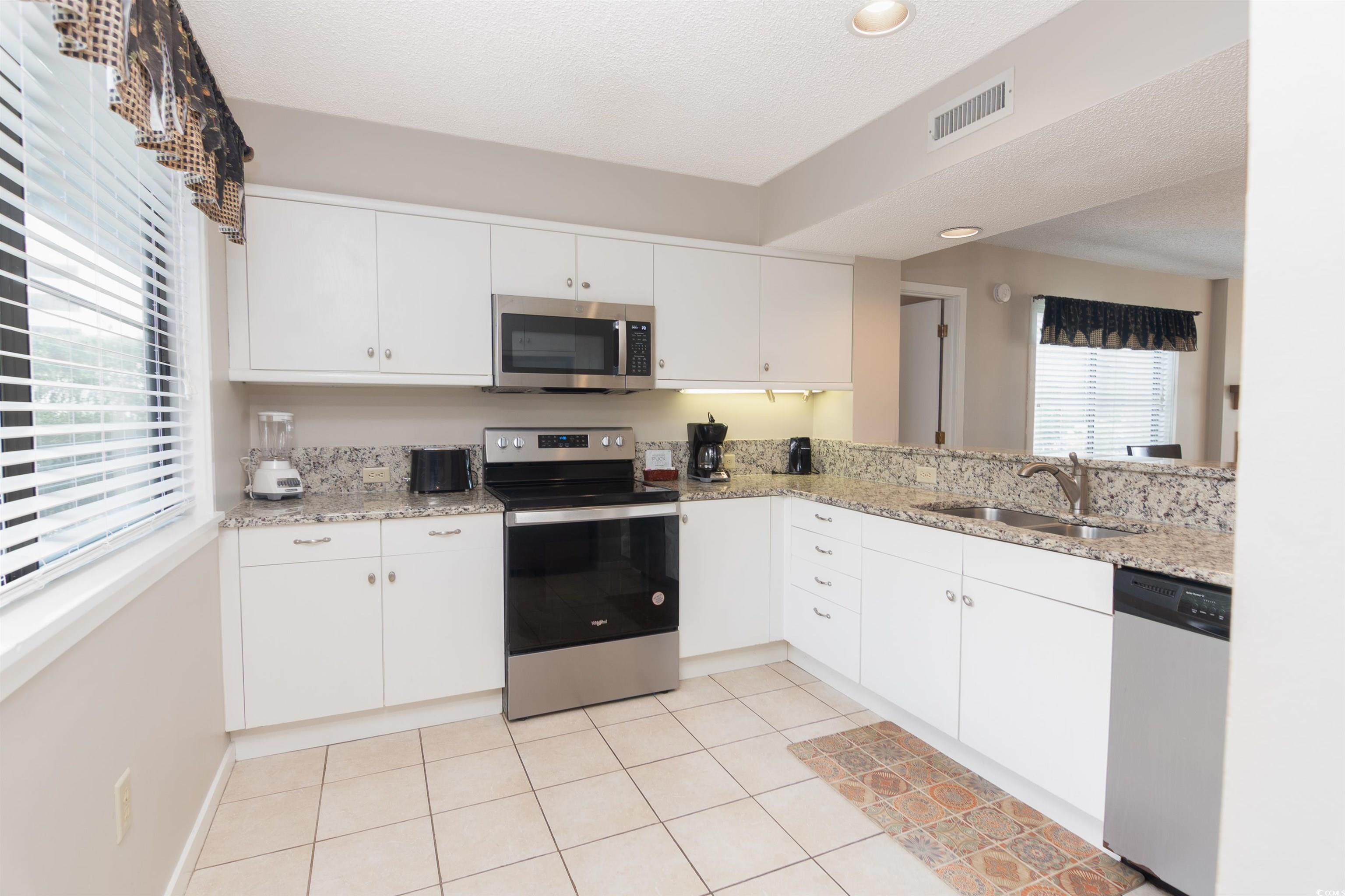 Listing Photo 4 - Condo for sale in building located at 125 Hartland Dr, Myrtle Beach, SC 29572 - Unit #9-A