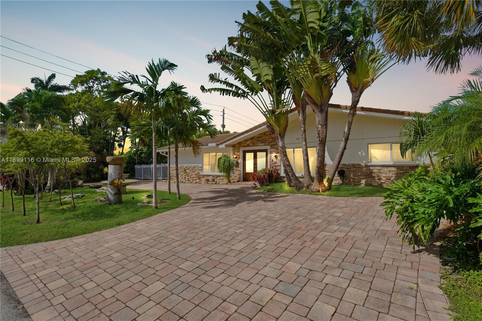 Discover your slice of paradise in prestigious Lighthouse Point! This beautifully updated 3BR + den/office, 3 BA home in sought-after Venetian Isles & offers 107' on a deep, wide canal w/ no fixed bridges—enjoy direct Intracoastal & ocean access. Boater’s dream w/20,000LB 4-post elevator boat lift (new in last 4 yrs). Major upgrades incl: new PVC drain lines, elec, tankless water-heater, floors, impact glass windows, baths & stunning gourmet kitchen feat. huge island, Sub-Zero fridge, SS appls & gas cooktop. Spacious living areas flow to a private tropical patio w/ marble pavers & lush landscaping—perfect for entertaining or relaxing. Just mins to Hillsboro Inlet & LHP Yacht Club. Meticulously maintained, move-in ready & in one of South Florida’s most desirable waterfront communities.