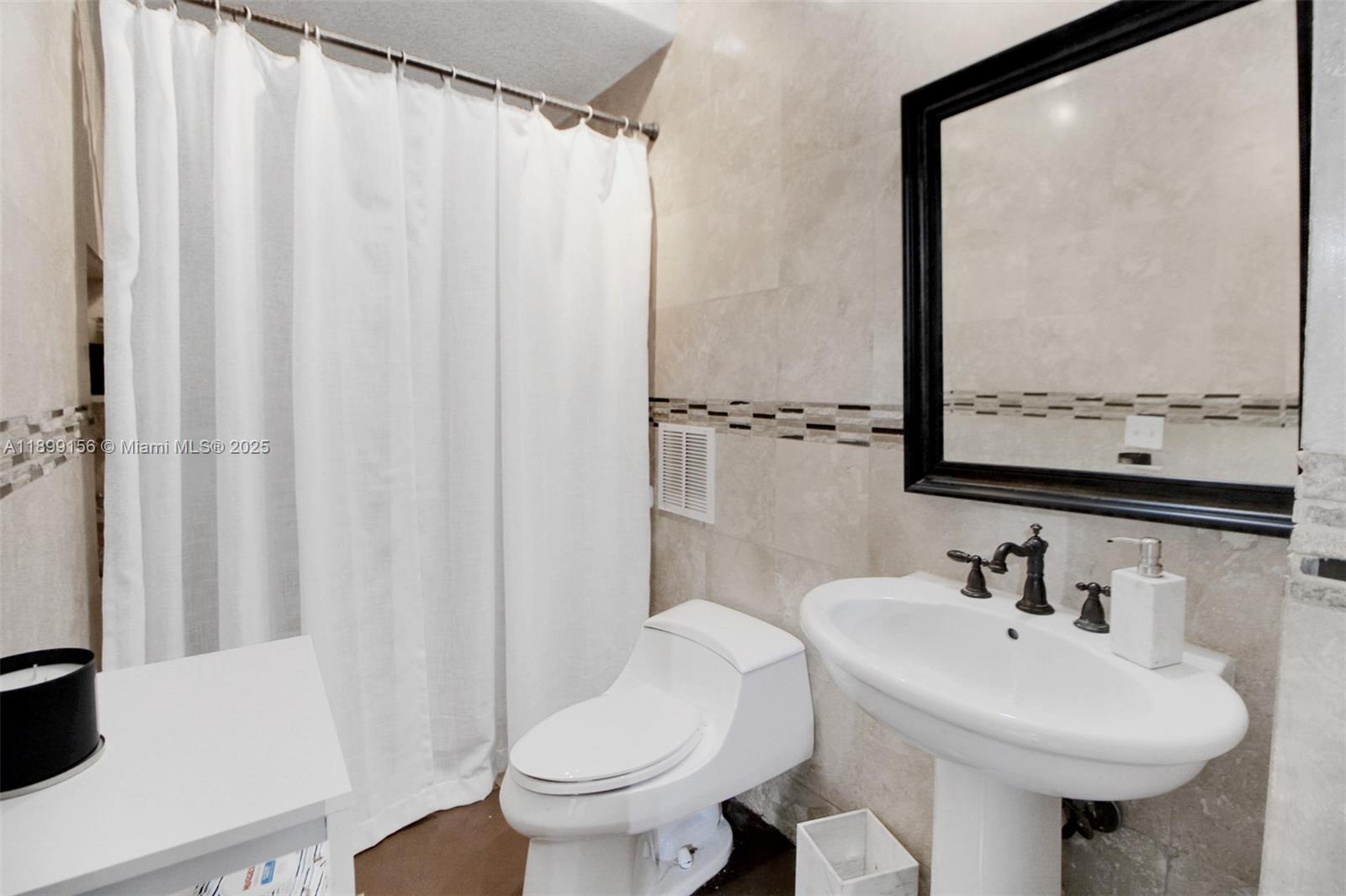 STOP THE SCROLL, THIS IS IT! Stunning 2019-built ranch estate on nearly 4 acres in the highly sought-after Redlands! This 6BR/6BA luxury home offers over 11,000 sq ft of living space with a circular driveway entrance & high-end finishes throughout. Designed for sustainability & privacy, the property features 60 solar panels with a 20KW InPhase battery backup, EV charging stations & fertile land with mature mango, papaya & carambola trees. Enjoy a concrete roof, PGT impact windows/doors & full hurricane-proof construction. Includes a fully built underground bunker/garage with space for up to 18–20 vehicles, wine cellar & a pool shell with piping under the deck. Horse trails & the scenic C-102 canal nearby! Lot can be divided and 2-3 homes can be built for a true multi-generational compound!