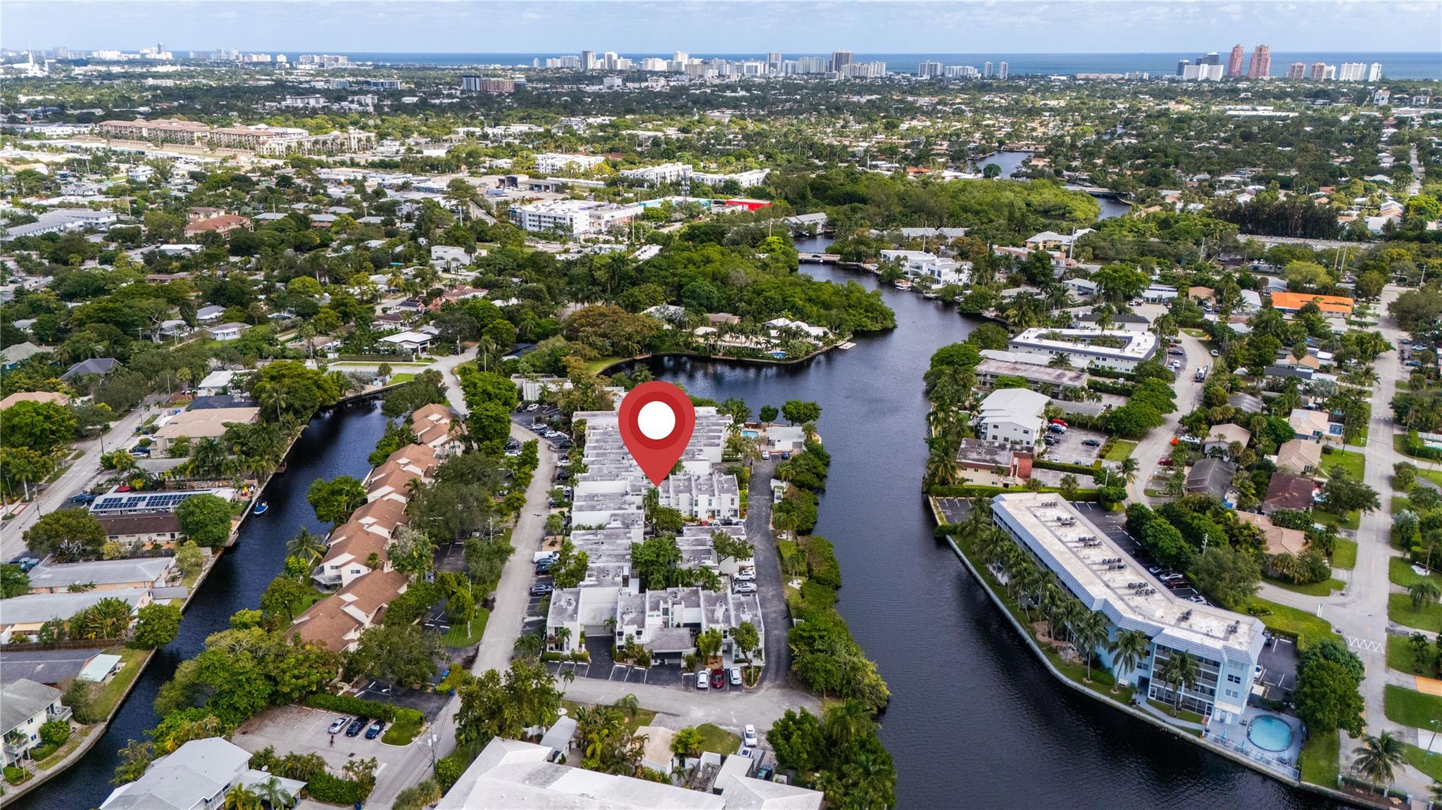 Experience waterfront living at its finest in the heart of Wilton Manors, just minutes from downtown Fort Lauderdale. This fully updated townhome features rare full 2 car garage, new roof, AC & seawall, & brand new impact windows & doors. The home boasts dual master suites with designer finishes, updated bathrooms & new flooring throughout. The modern kitchen is complete with quartz countertops and SS appliances. Step outside to the serene open brick paver patio, with tranquil waterfront views ideal for relaxing or entertaining guests. Bring your paddleboard or fishing pole, and HOA allows docks with approved permits and plans. Home is on a quiet low-traffic street. Additional amenities include pool & two assigned parking spots. No assessments. Easy to show.