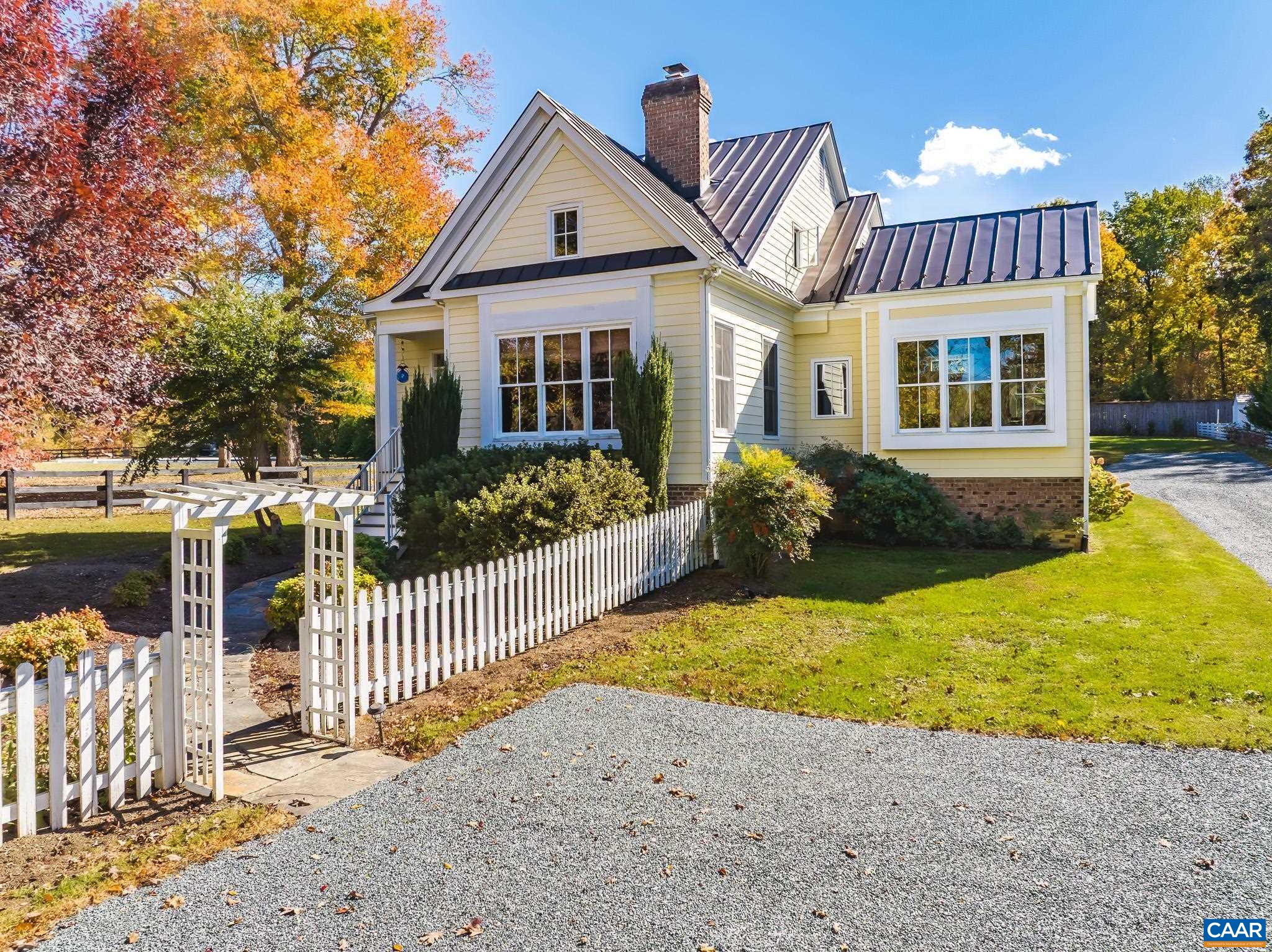 OPEN HOUSE Sun Dec 7, 1 to 3 pm Almost a Black Friday Special!  Price adjusted $60,000 by our motivated sellers. Our beautiful Arts and Craft style home is surrounded by horse farms in Keswick Hunt country. Our 3 bedroom, 2 bath 2,200+ sf home is now mainly vacant so you can now imagine your own furniture concepts. We feature oak floors, a double sided masonry fireplace, stainless steel appliances, granite countertops, vaulted ceilings, a luxurious master suite with a balcony, a jetted tub, Italian ceramic tile, and many built in cabinets and shelves. It is 6x2 construction with a standing seam metal roof, Hardiplank siding, Trex decking, a full unfinished 1,200 sf basement, solar panels, is generator ready and sits on .7 acres landscaped acres. We also feature a delightful sun room and a detached 672 sf garage with an apartment above it, ideal for guests and is a legal approved Airbnb