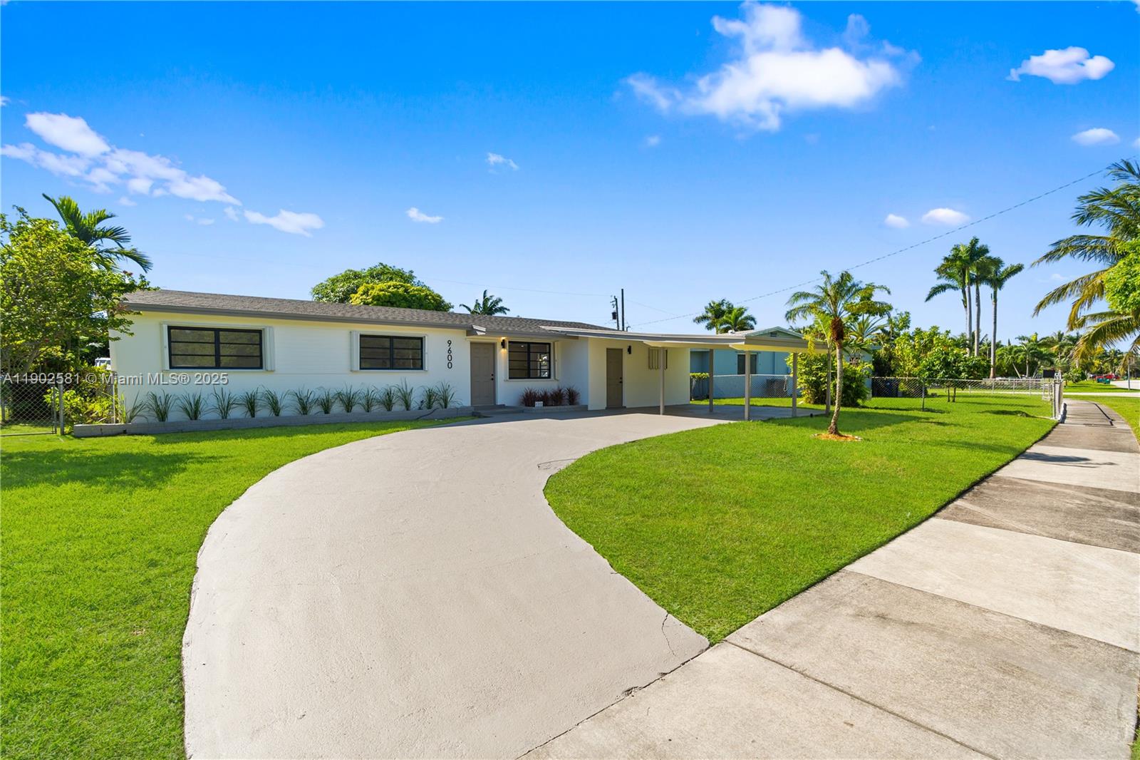 RECENTLY REMODELED in 2025, this bright and spacious 4-bedroom, 2-bath home features a 2,000 SQFT modern FLEXIBLE/ OPEN FLOOR PLAN filled with natural light. Enjoy peace of mind with a NEW roof, updated electrical, plumbing, and AC systems. The NEW kitchen offers sleek cabinets, a large island with quartz countertops, and stainless steel appliances. Other upgrades include NEW oakwood vinyl plank flooring, LED lighting, NEW interior doors, moldings, and fresh paint inside & out. The fenced yard features fruit trees, a covered terrace & ROOM FOR A POOL OR FUTURE EXPANSION. Accordion shutters, impact doors, and a covered carport add comfort and convenience. Close to shops, dining, and Black Point Marina. NO HOA, LOW taxes, and LOWER insurance!