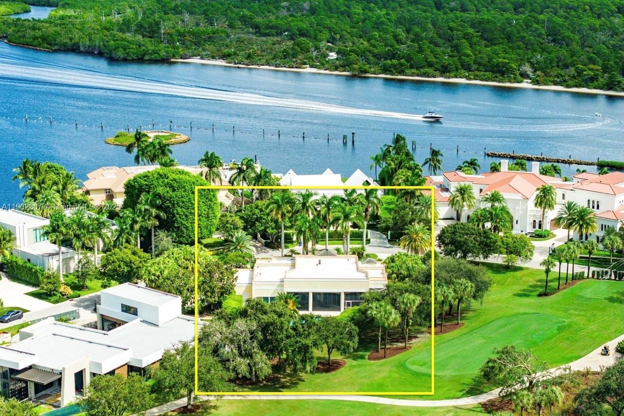 Exceptional opportunity in Admirals Cove! Situated on a rare .65-acre golf course lot along prestigious Spyglass Lane, this single-story CBS home offers 4,393 sf under air & over 6,100 total sf. Garage accommodates two cars + one golf cart.  High ceilings, open living areas, large kitchen, & expansive primary suite. Screened patio, pool, and lush landscaping create serene outdoor living. Ideal to enjoy as is, renovate, or rebuild a new estate potentially capturing Intracoastal views. Surrounded by new luxury homes.  Moments from the Club at Admirals Cove's exceptional amenities & activities. Buyers with a fully executed contract entered into before 11/1/25 will not have to pay the Club's announced increase in its nonrefundable initiation fee even if closing occurs on or after 11/1/25.