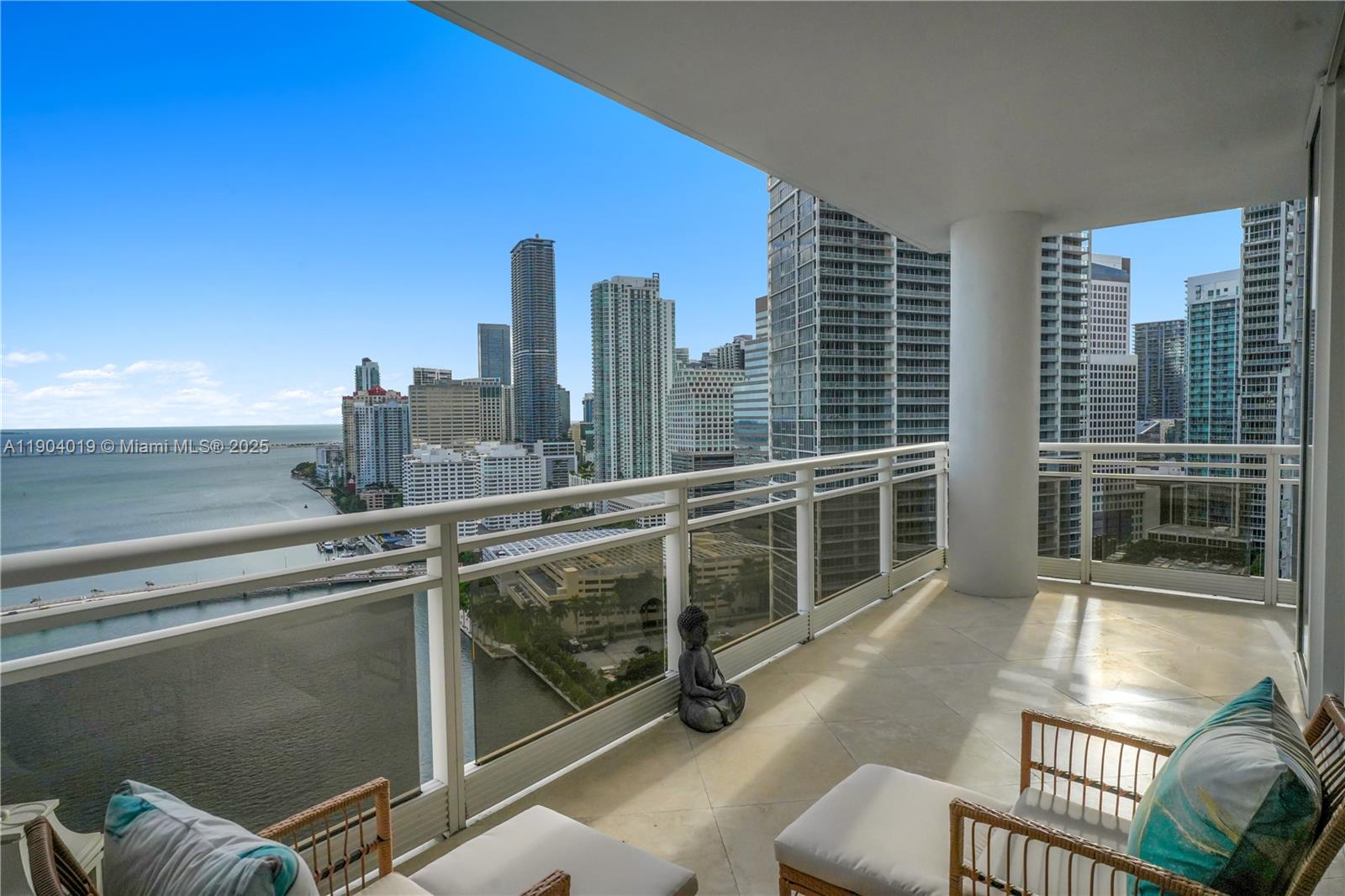 This phenomenal residence in the sky offers breathtaking panoramic views of Biscayne Bay and the Miami skyline from every window. The gourmet kitchen showcases custom Brazilian quartzite countertops, backsplash, and waterfall island, along with a sleek induction cooktop and a custom bar featuring a dual-zone 24-bottle wine fridge. Elegant marble floors flow throughout the home, creating a seamless sense of luxury. Carbonell provides an island oasis with resort-style amenities, including 2 tennis courts, golf putting green, indoor racquetball & basketball courts, a heated pool and jacuzzi, BBQ area, concierge, complimentary guest valet, children’s playroom, a two-story fitness center, party room, conference room, and business center. Experience an island lifestyle in the heart of the city.