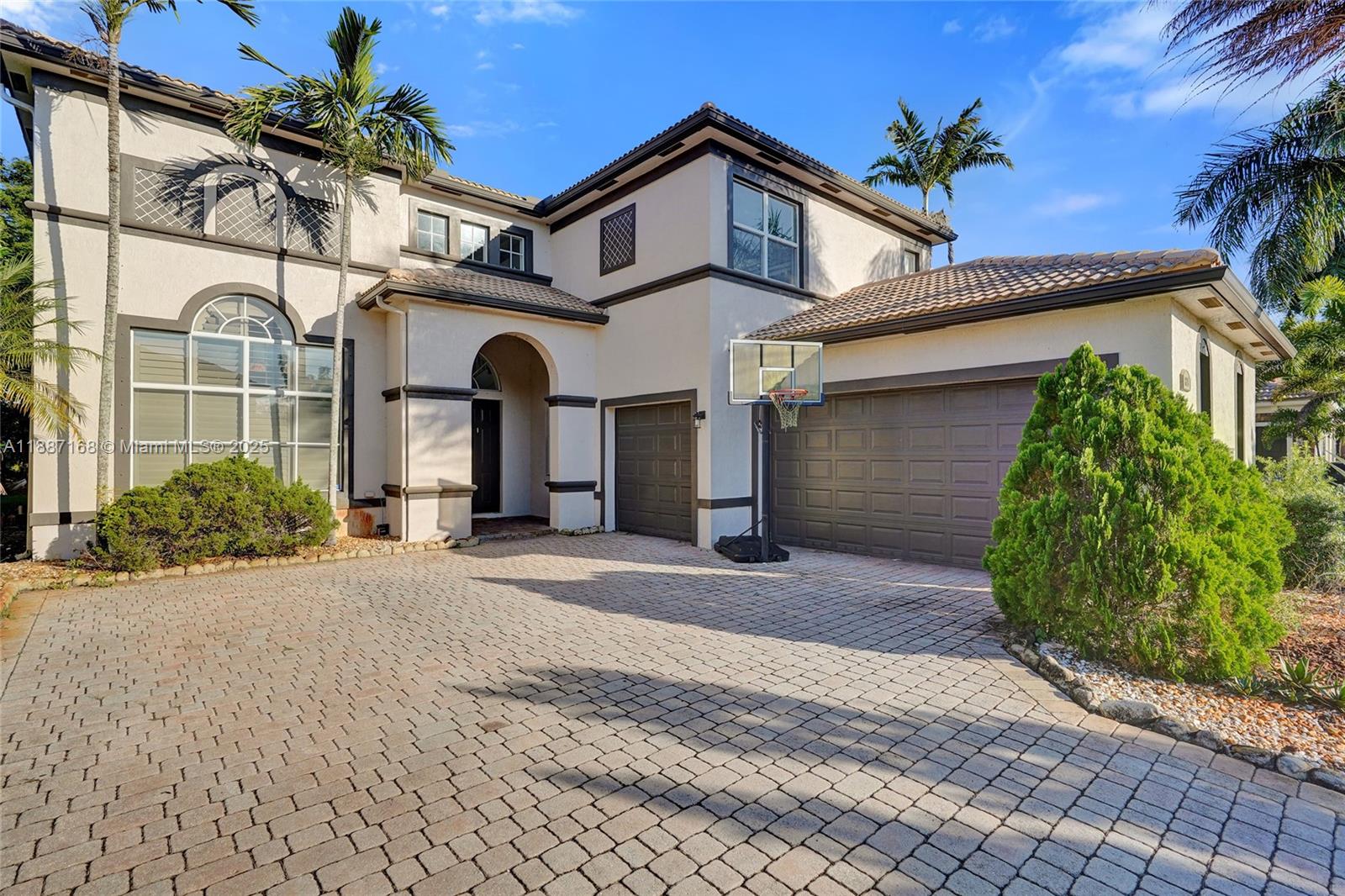 Located in the exclusive gated community of Cobblestone Creek in beautiful West Boynton Beach, just south of Wellington, this spacious 5BR/3BA home with a 3-car garage offers incredible potential. Double-door entry, soaring ceilings, and a sweeping circular staircase create an impressive welcome. Main level includes a full BR/BA ideal for guests or a home office. Kitchen w/ granite & wall oven opens to large family room + formal LR/DR. Upstairs features 4 generous BRs + 2 BAs. Recent updates provide a strong foundation — just add your finishing touches to personalize and maximize value. Resort-style community amenities include clubhouse, fitness center, pool, and manned gate. Prime location near shopping, dining & top schools.