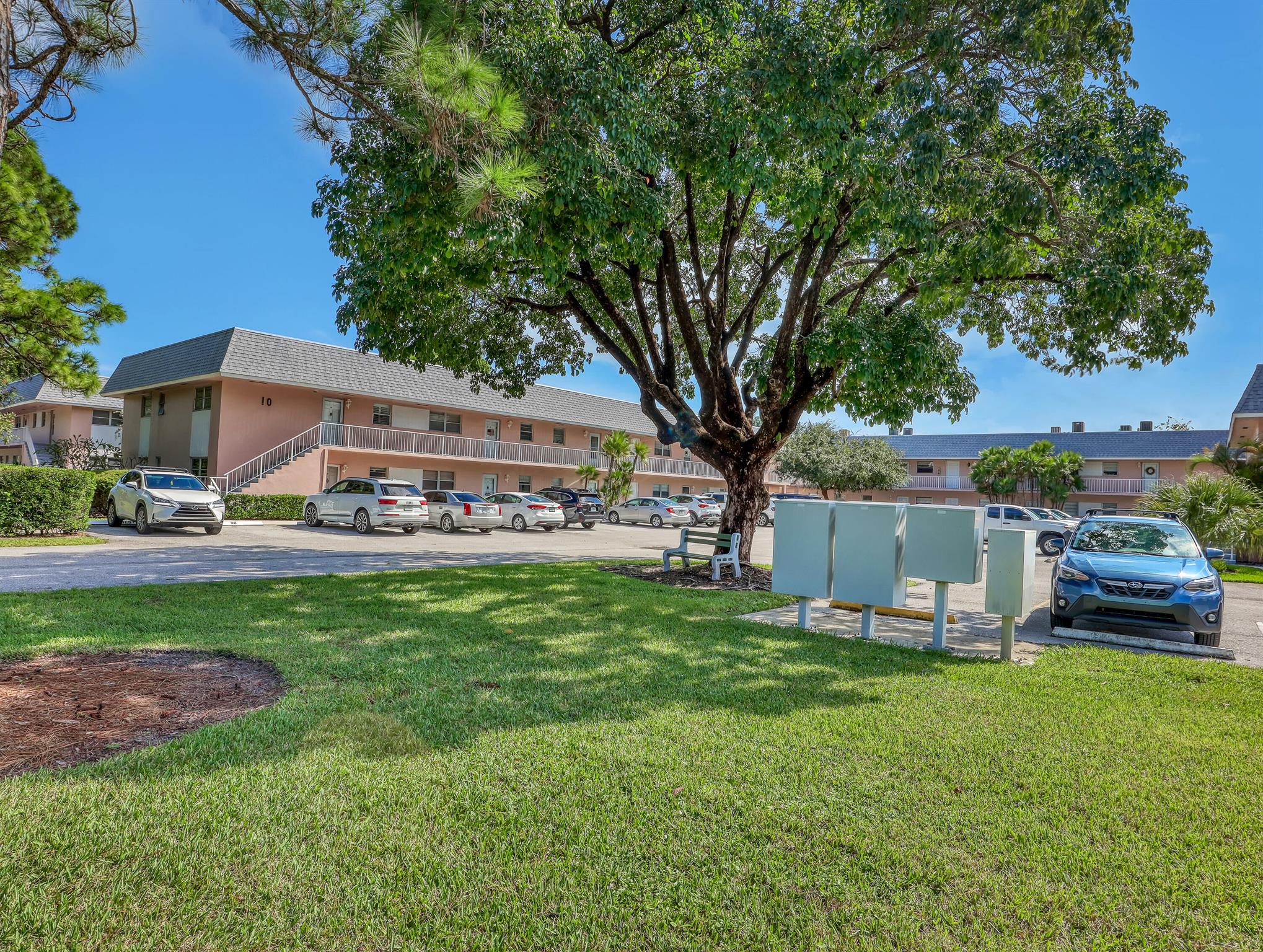 Beautifully upgraded 2BR/2BA corner unit on desirable first floor in active 55+ community with tranquil  setting. New Ac, water heater, open floor plan with neutral decor, travertine tile throughout, granite countertops in kitchen and baths, stainless steel appliances. Spacious living/dining flows to private screened lanai. All Assessments paid!! New Roof! Upgrades include: newer A/C, remodeled baths with new vanities, granite counters, frameless glass showers, updated lighting, and walk-in California closets in both bedrooms.Exceptional amenities: Large pool, tennis, shuffleboard, active clubhouse. Tennis and golf privileges included in HOA. Social gatherings and calendar of events those who like to mingle. Minutes to beaches, shopping, and dining.Florida dream can be yours!