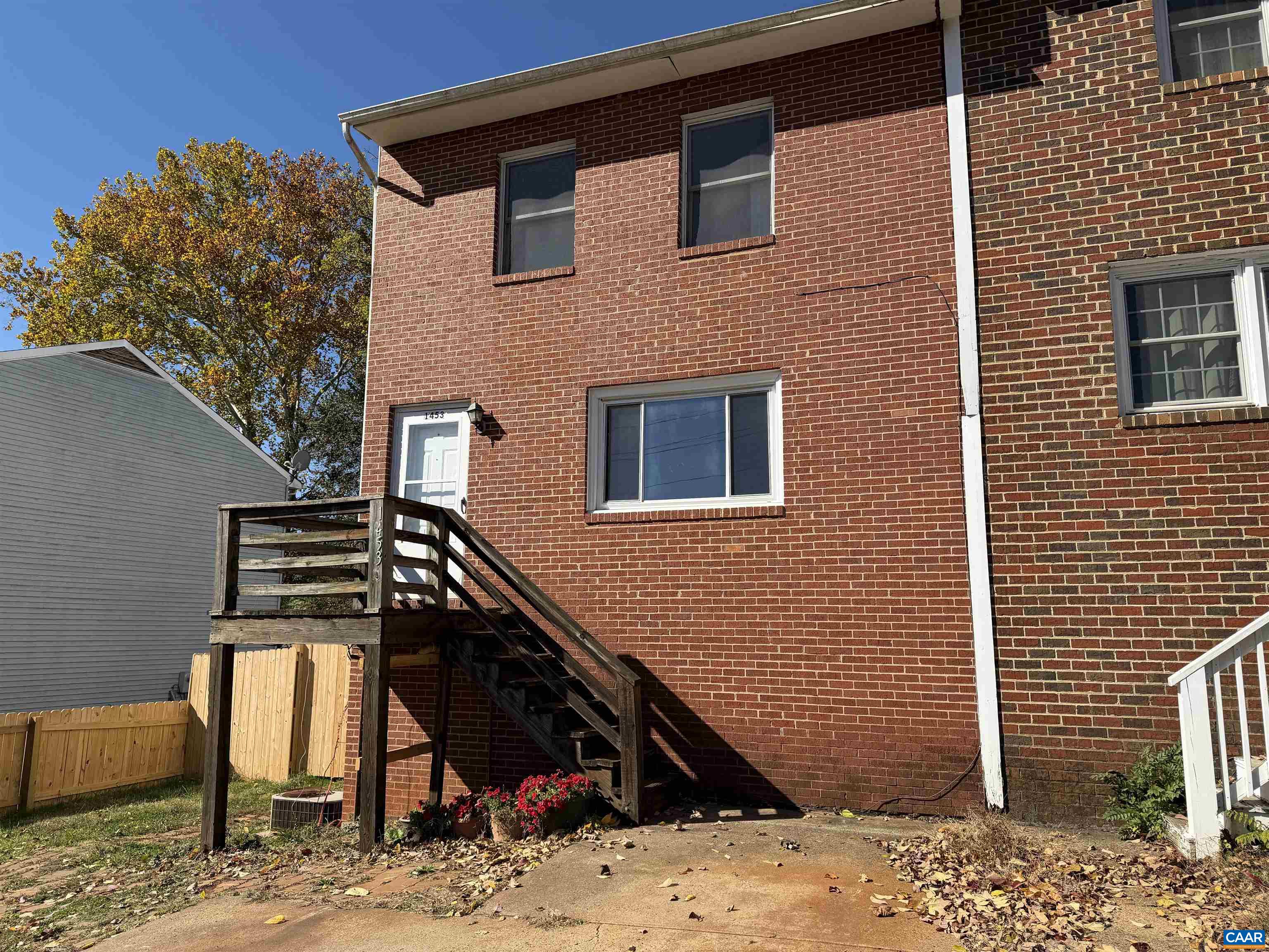 Discover the potential at 1453 Avon Street! This three-bedroom, 1.5-bath townhome offers a great opportunity to customize a home in a fantastic Charlottesville location. The main level features a spacious living area and kitchen with access to the backyard—perfect for pets and play. Upstairs, you’ll find three bedrooms and a full bath ready for your updates. The full, unfinished, walkout basement provides ample storage or expansion potential and includes a gas wall heater, and a pet door leading to the fenced yard. New backyard privacy fence has just been installed. With some flooring and cosmetic upgrades, this home can truly shine. Just minutes from downtown, UVA, and I-64, this property offers location, convenience, and value!opportunity to make this townhome your own.