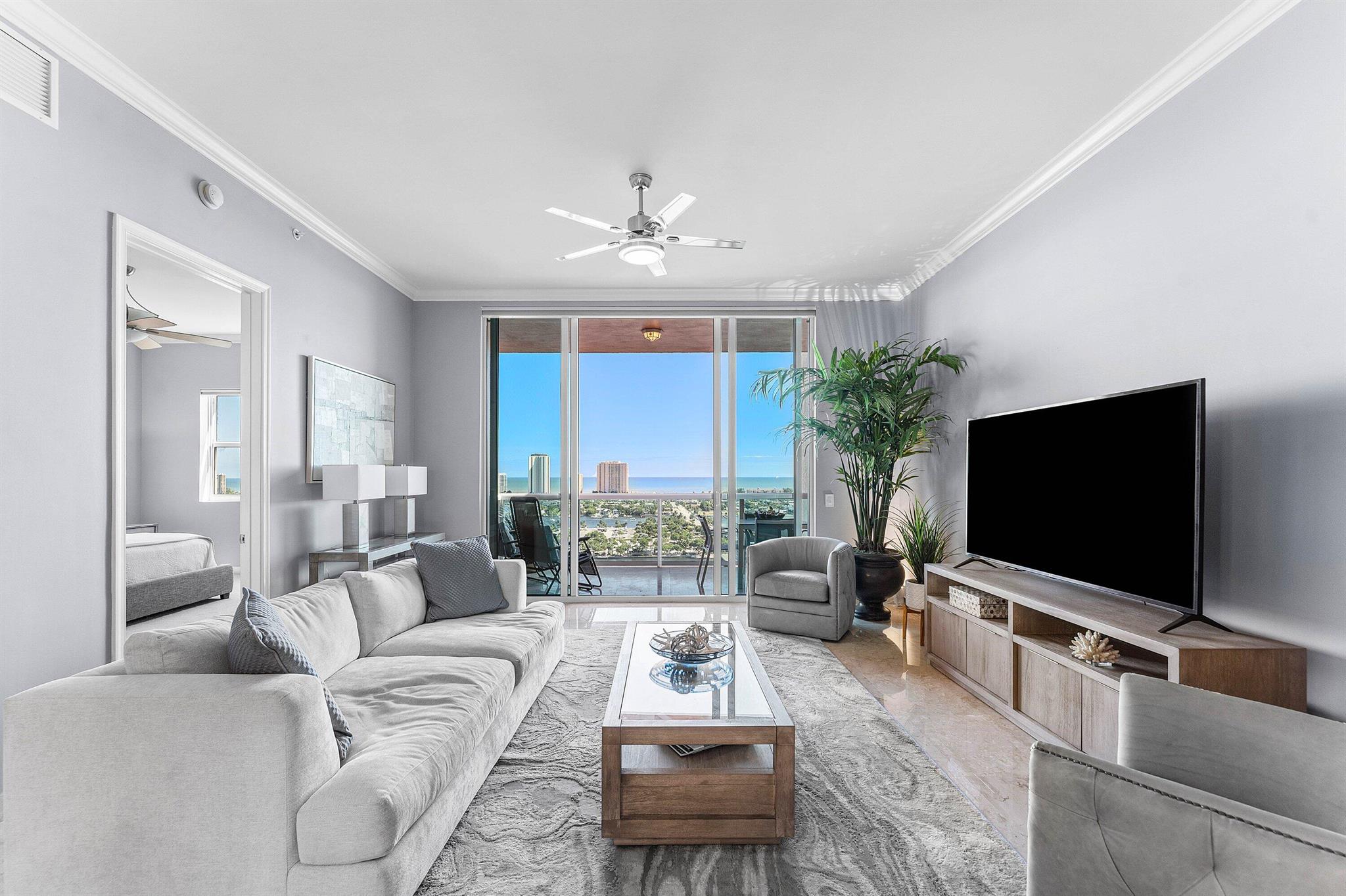 PENTHOUSE 22nd floor 2BR/2.5 BA w DIRECT Intracoastal & ocean views! Italian marble floors, high ceilings, 2 skylights, open concept, beautifully designed, neutral colors, crown molding, split floor plan. Spacious owners suite w/his & her walk-in California  closets. Primary bath w/double vanity, jetted bath, water closet. Very private covered balcony. Impact glass, semi-private elevator access. Assigned garage parking (close to elevator!) & climate-controlled storage unit. 24/7 manned gate, valet, NEWLY renovated rooftop oasis w/pool, spa, BBQ areas, tennis, pickleball, & bocce. Clubhouse, billiard room & fitness center, walking path w/gazebo, Adjacent marina w/dry docks, minutes to the ocean, no fixed bridges. Pet friendly.