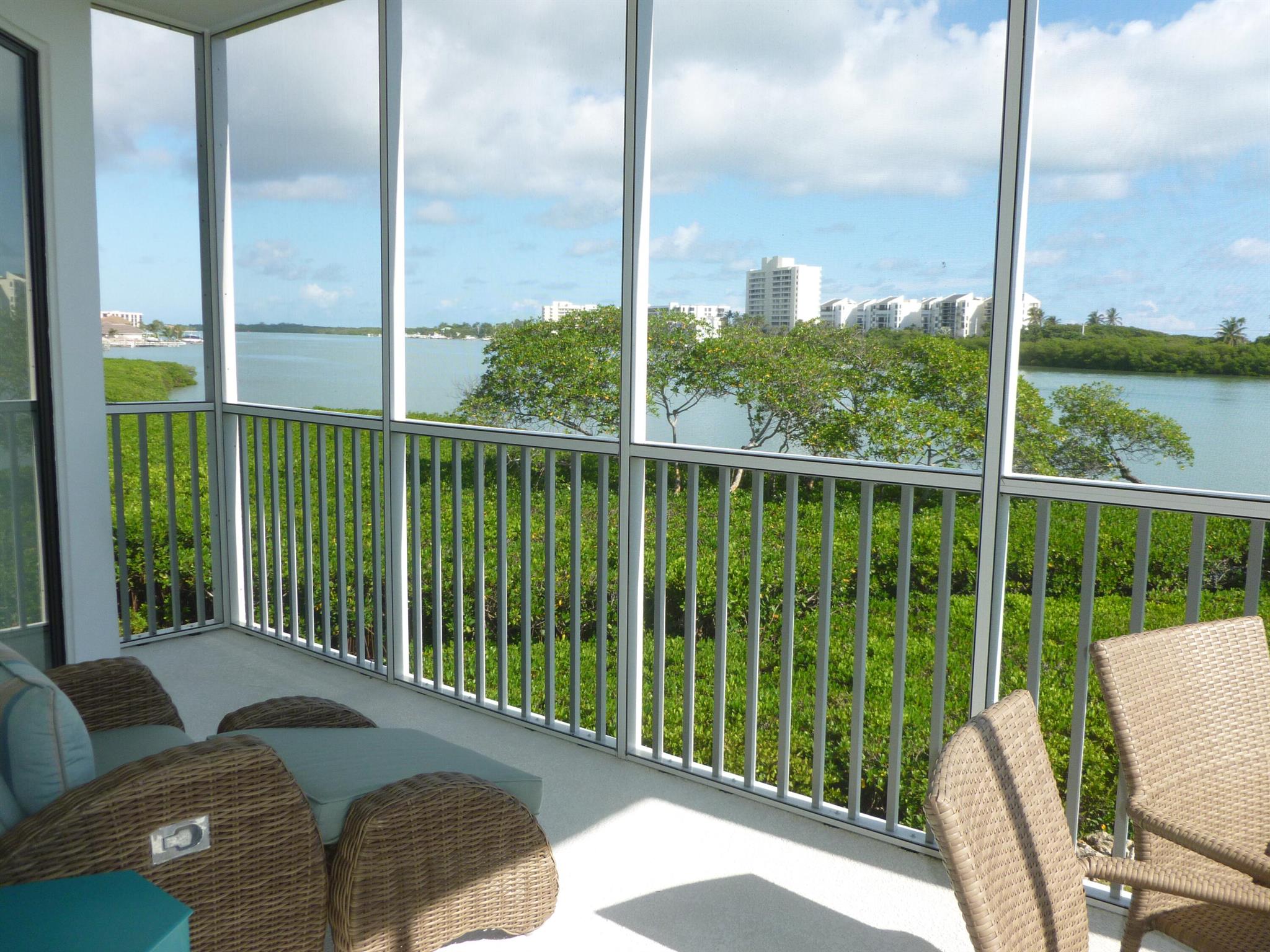 Direct panoramic Intracoastal vistas.  Light and bright with a spacious floorplan. Two screened patios with one conveniently located off the kitchen.Tequesta Cove has a lovely pool area complete with Bar B Que facilities.  There is a day dock and a Kayak storage area.  A pleasant walk or short drive to shopping and various restaurants.