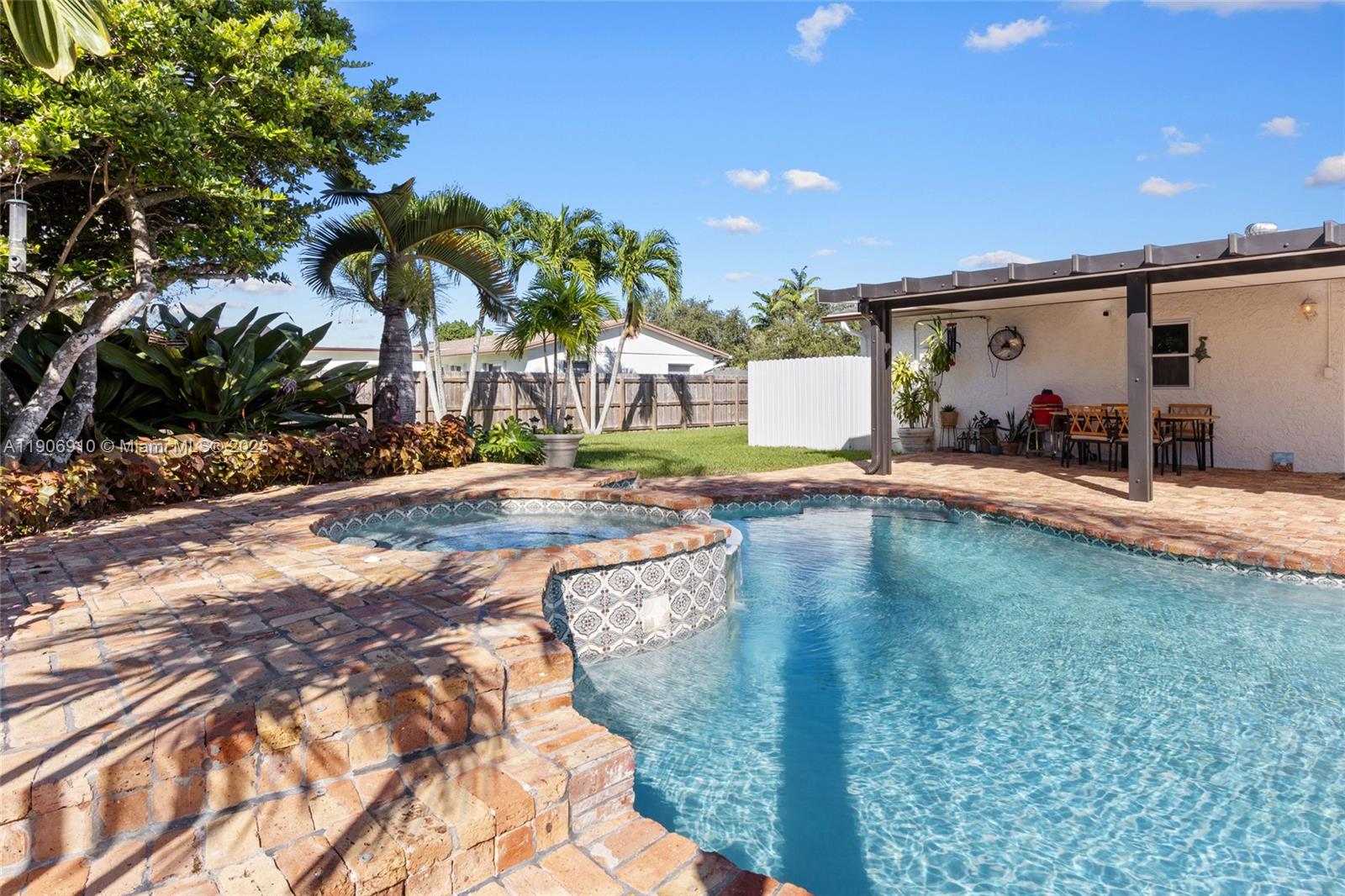 Beautifully renovated 3/2 home on a spacious corner lot in Cutler Bay! This bright, open-concept residence features new flooring and a fully remodeled kitchen with quartz tops, s/s appliances, and cabinetry, floor-to-ceiling windows that bathe the home with natural light. A versatile office space which can be converted into a 4th bedroom. The home also includes approximately 160 sq. ft. of additional living space under A/C not reflected on the tax roll. Step outside to your private tropical oasis featuring a sparkling pool, jacuzzi with gas heater, lush landscaping, covered patio, and kids’ play area—perfect for entertaining. Additional highlights include freshly painted interior and exterior, ample parking, no HOA, and space for a boat or trailer. This move-in-ready gem truly has it all!