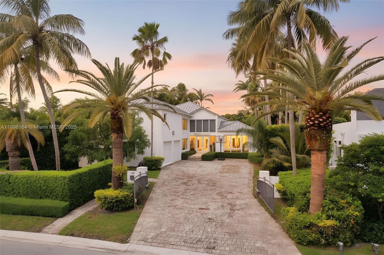 Located within the exclusive guard-gated Bal Harbour Village, 145 Biscay Drive is a rare opportunity to own a two-story 5 bedroom, 5.5 bath residence with over 5,000 sq.ft. of living space on a 12,400 sq.ft. lot. The home offers endless potential for a full renovation or the creation of a custom new-construction estate for the discerning buyer. Enjoy an unbeatable walkable location just moments from the beach, Bal Harbour Shops, world-class dining, 5-star hotels, and houses of worship—all within one of Miami’s most private and sought-after communities.