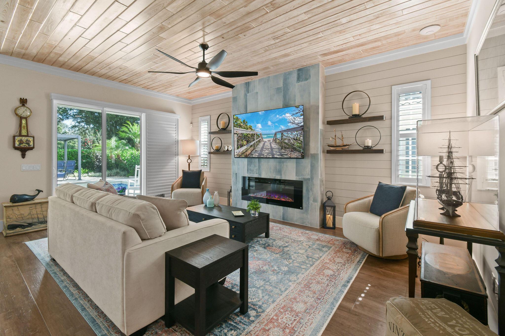 This home is truly a SHOW-STOPPER! This 1-story home was renovated from the studs in, with no expense spared. The home offers 3 spacious beds, a designer office, two beautifully finished baths, and a 2-car garage. Step outside to your private oasis featuring a heated 20x12 pool surrounded by a nearly maintenance-free backyard and lush greenspace behind the home for added privacy. Inside, soaring ceilings with stunning cypress wood detail and luxury vinyl flooring create a warm, elegant atmosphere. The living room's custom fire feature serves as a dramatic focal point, adding both style and ambiance. A full home generator ensures peace of mind year-round. The home stands apart from anything else on the market. MUST SEE!